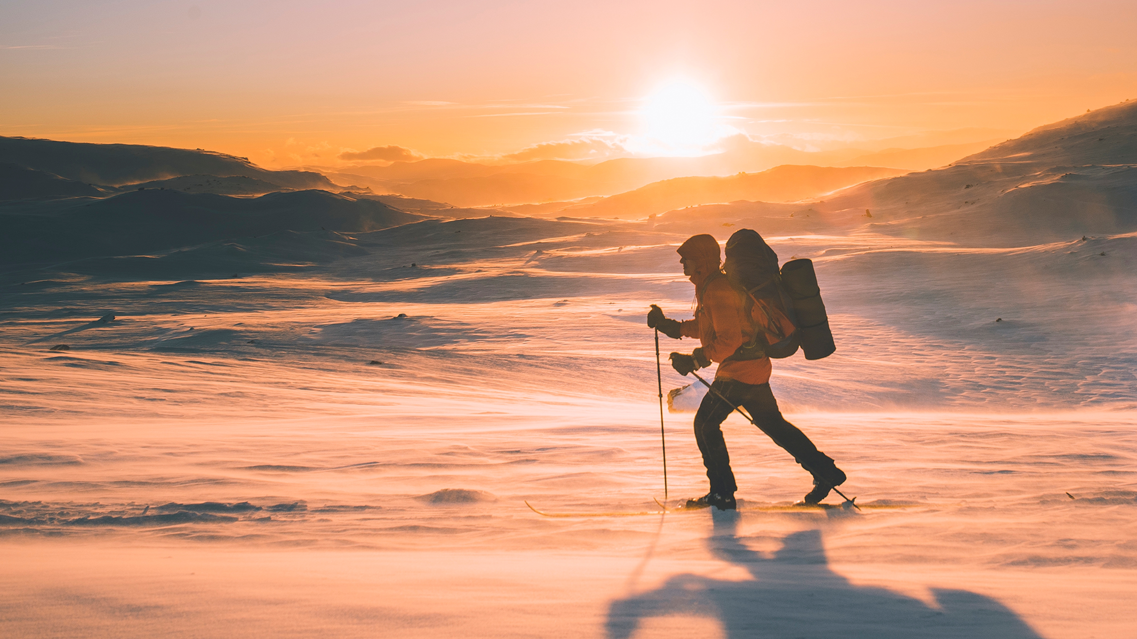 Cross-country skier in sunset, Breheimen national park in Norway