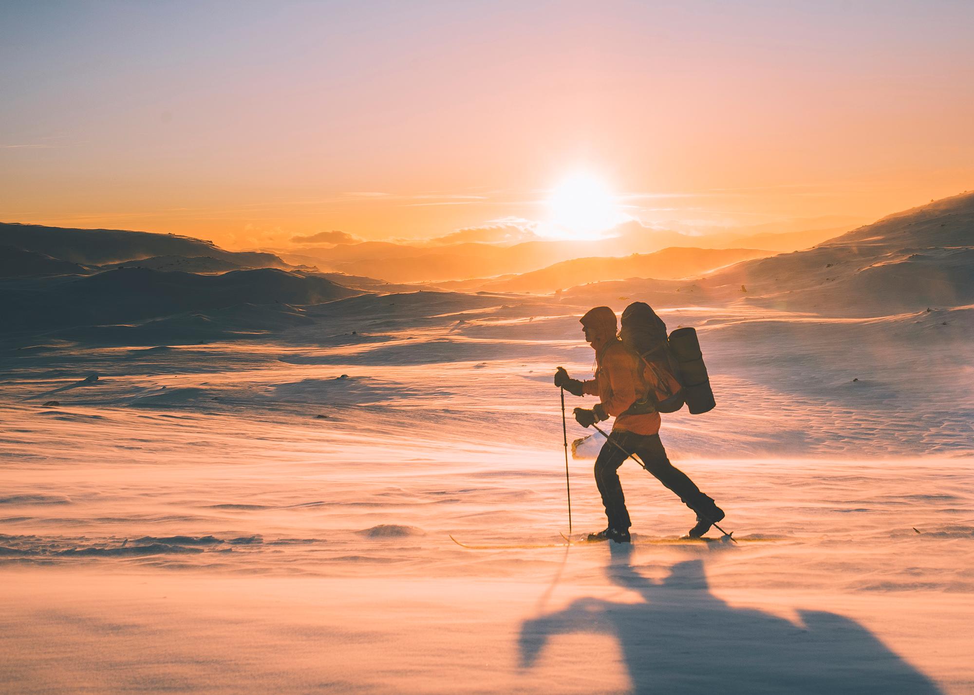 Cross-country skier in sunset, Breheimen national park in Norway