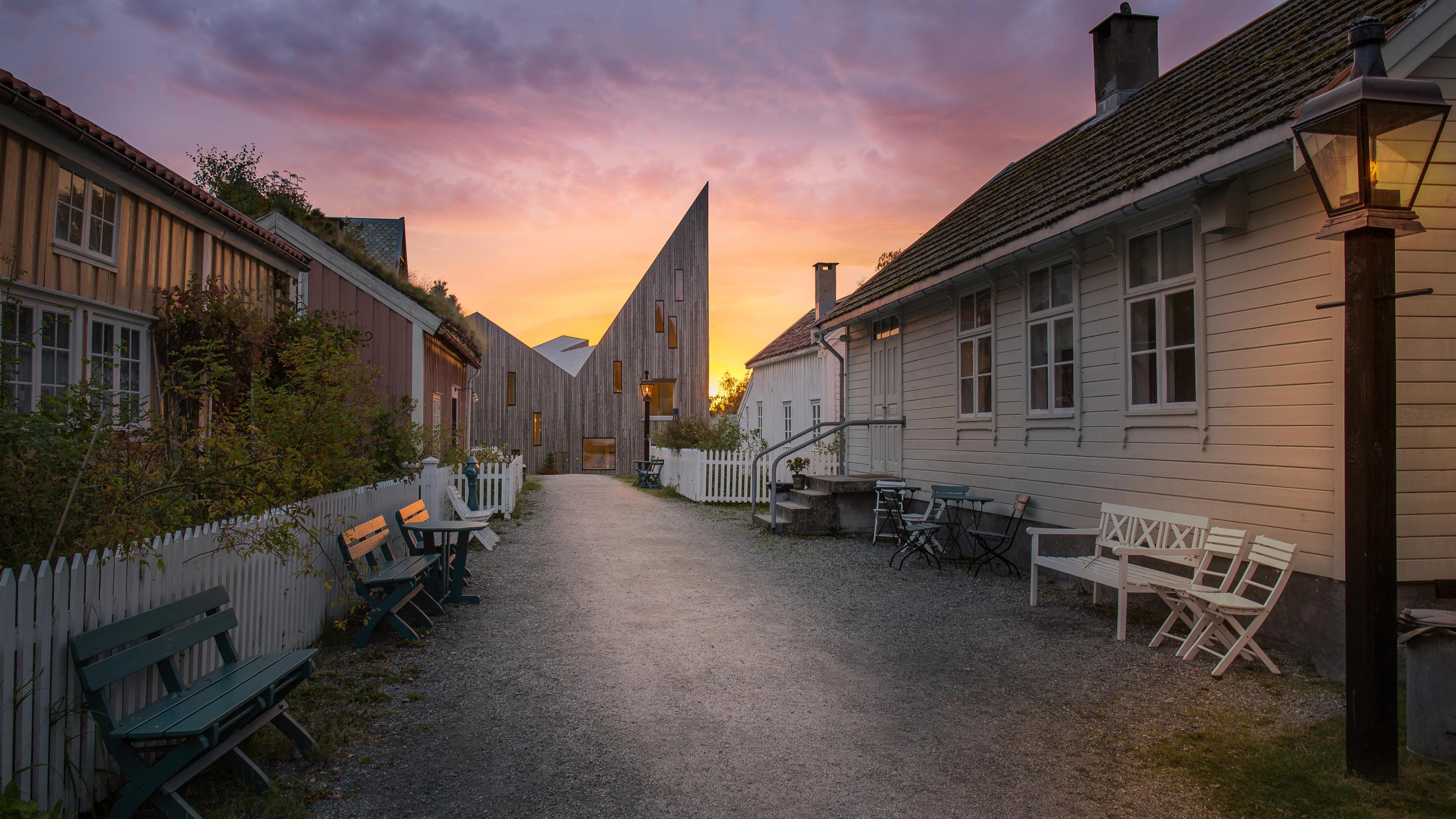 A street with old woooden houses at the Romsdal Museum in Molde.