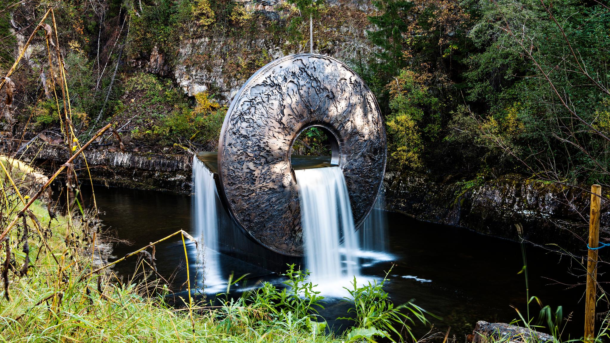 A sculpture where the river flows through at the museum in Jevnaker in Eastern Norway