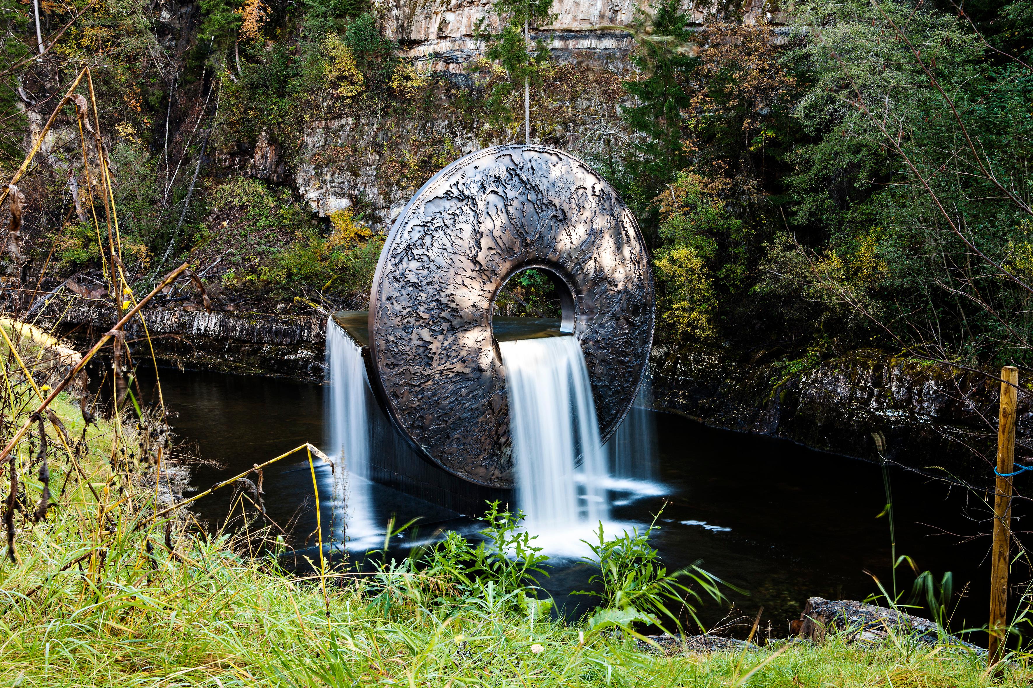 A sculpture where the river flows through at the museum in Jevnaker in Eastern Norway