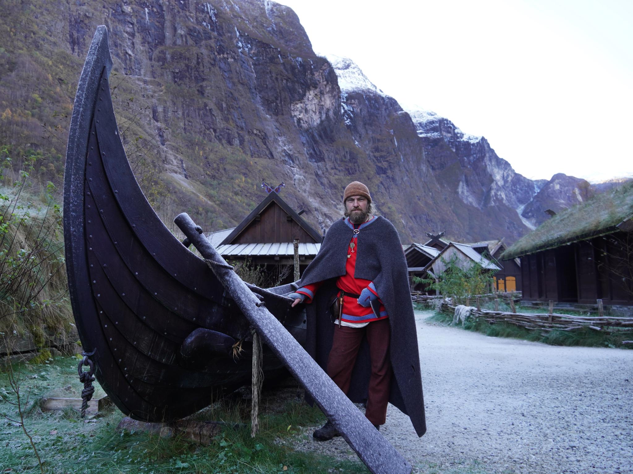 Viking in front of a viking ship in Viking Village in Gudvangen