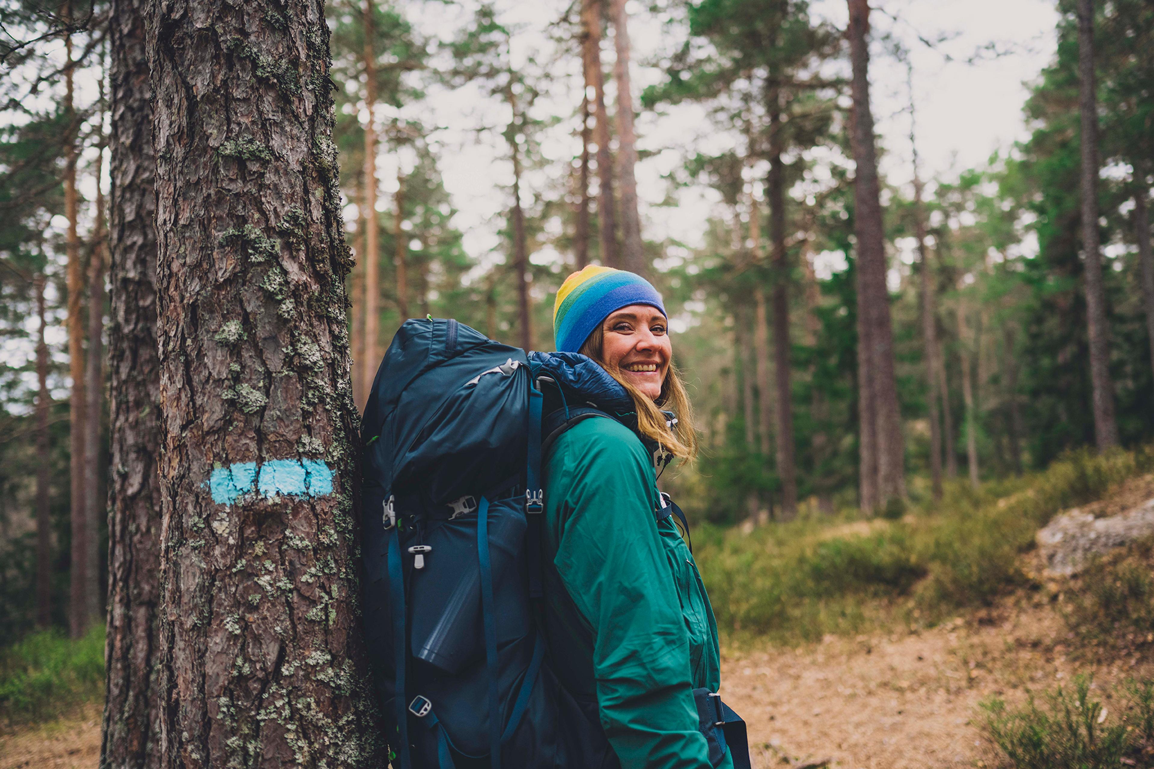 Woman hiking in Østmarka forest in Oslo, Eastern Norway