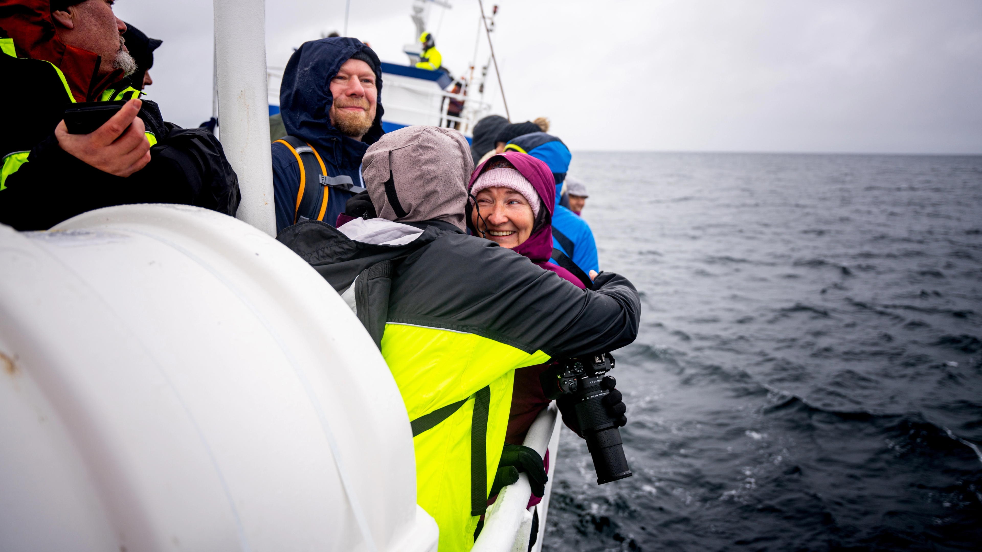 Happy tourists on whale safari in Andenes in Northern Norway