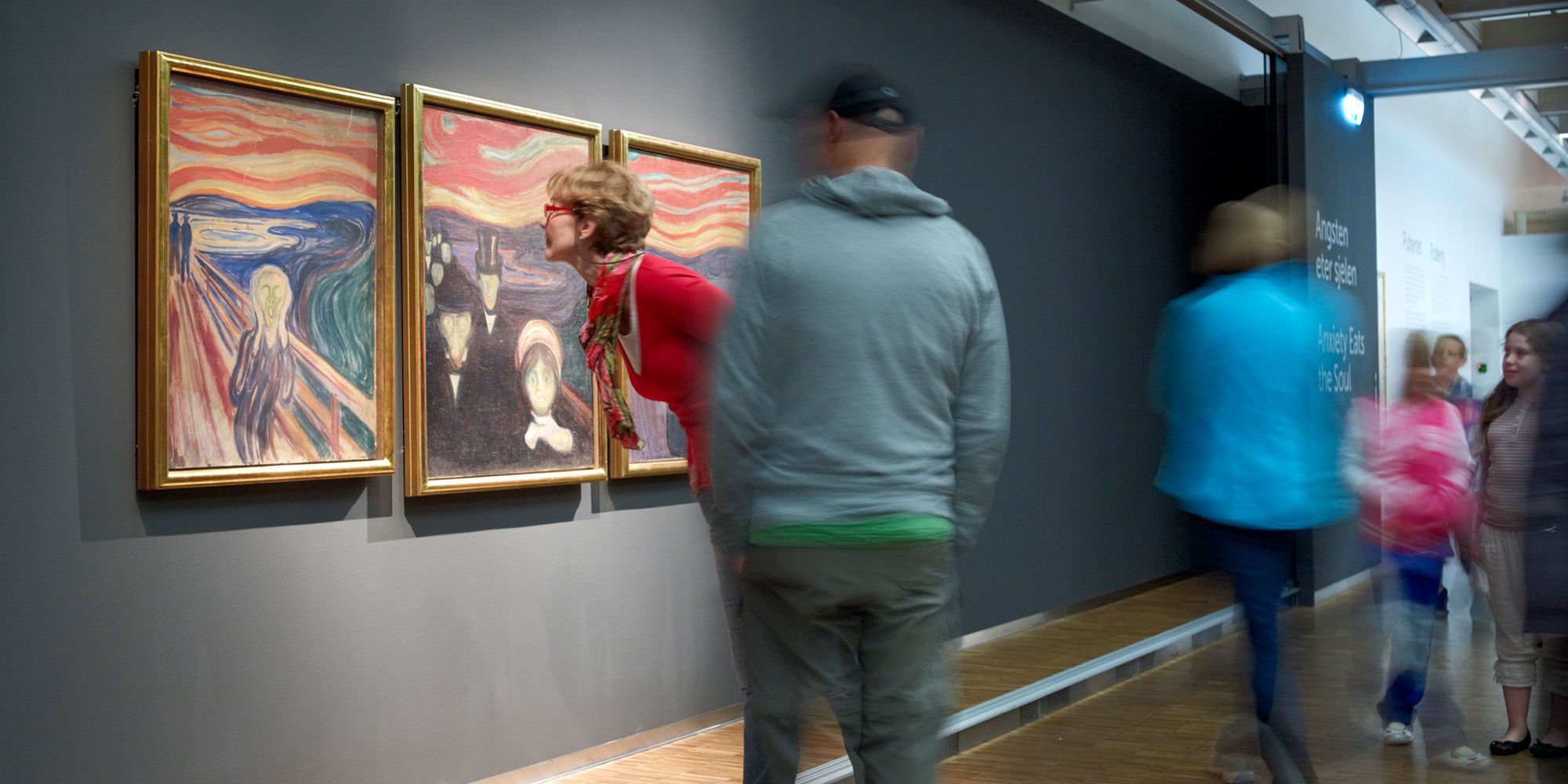 People looking at Edvard Munch’s Scream at The Munch Museum in Oslo