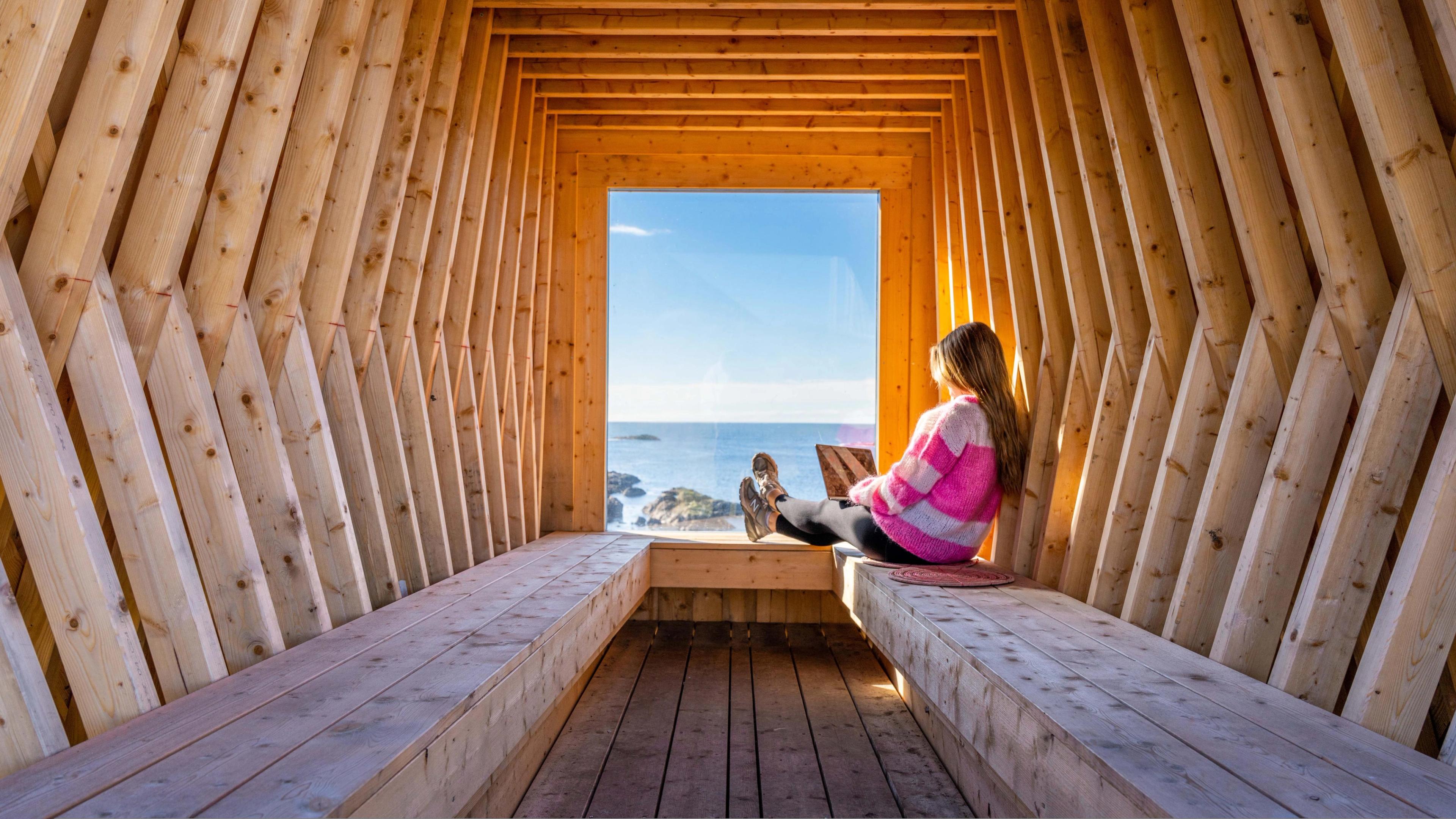 A woman working remotely from Nyksund, in stunning scenery