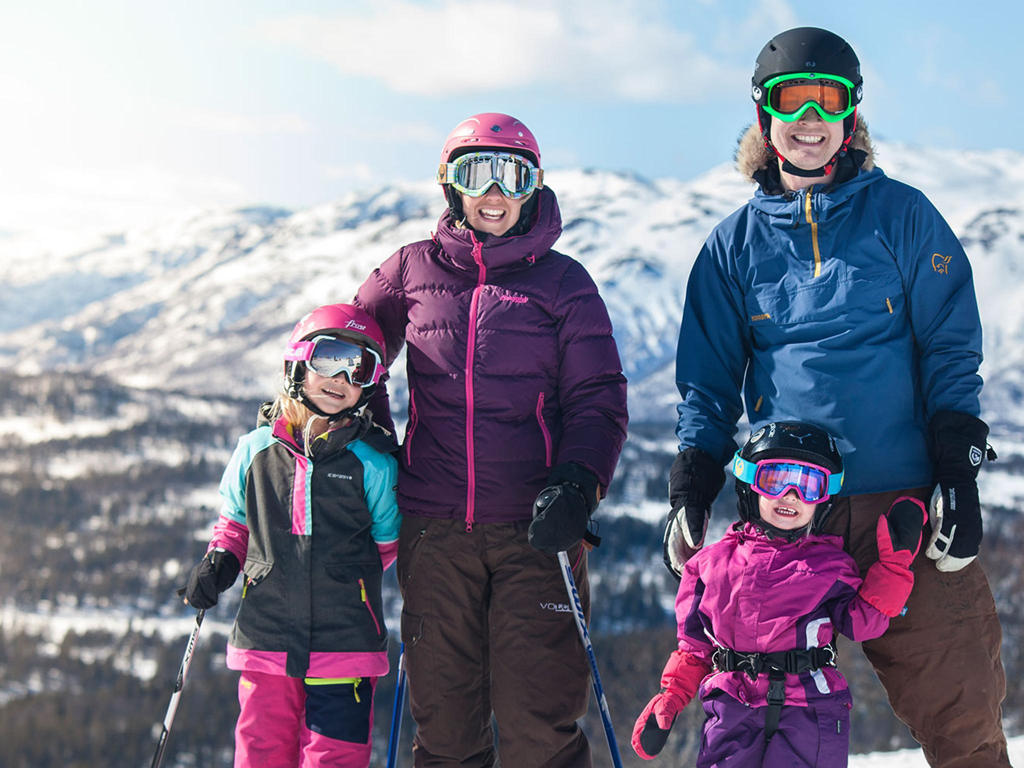 A family is going alpine skiing at Rauland, Norway.