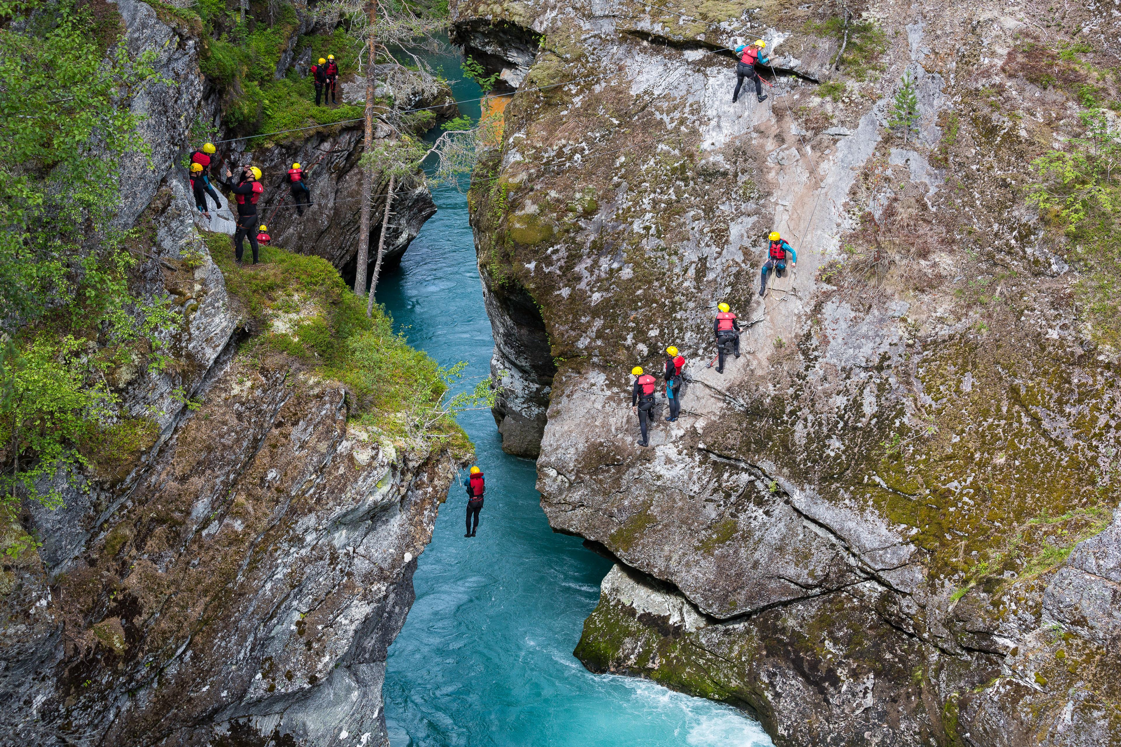 People canyoning in Valldal in Møre og Romsdal in Fjord Norway