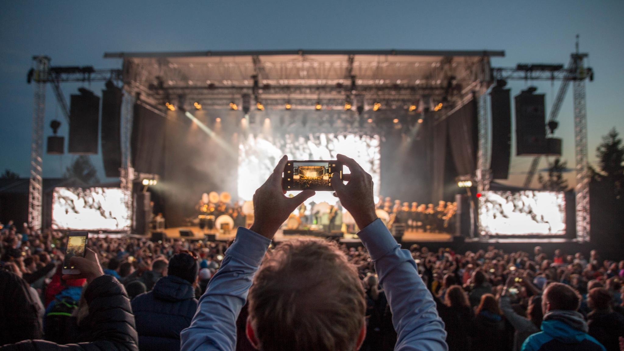 A large crowd in front of a stage at OverOslo music festival at Grefsenkollen in Oslo, Eastern Norway