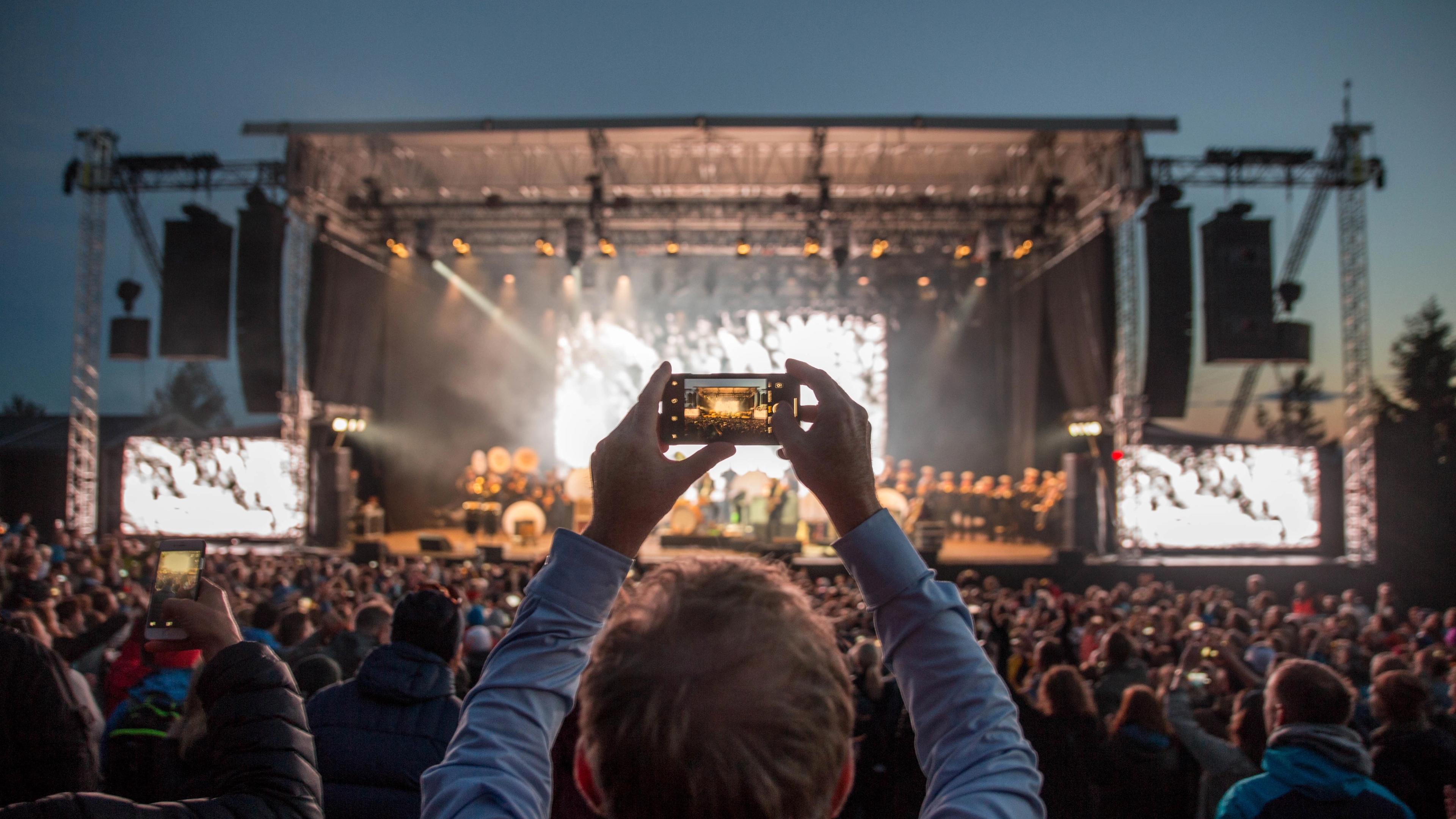 A large crowd in front of a stage at OverOslo music festival at Grefsenkollen in Oslo, Eastern Norway