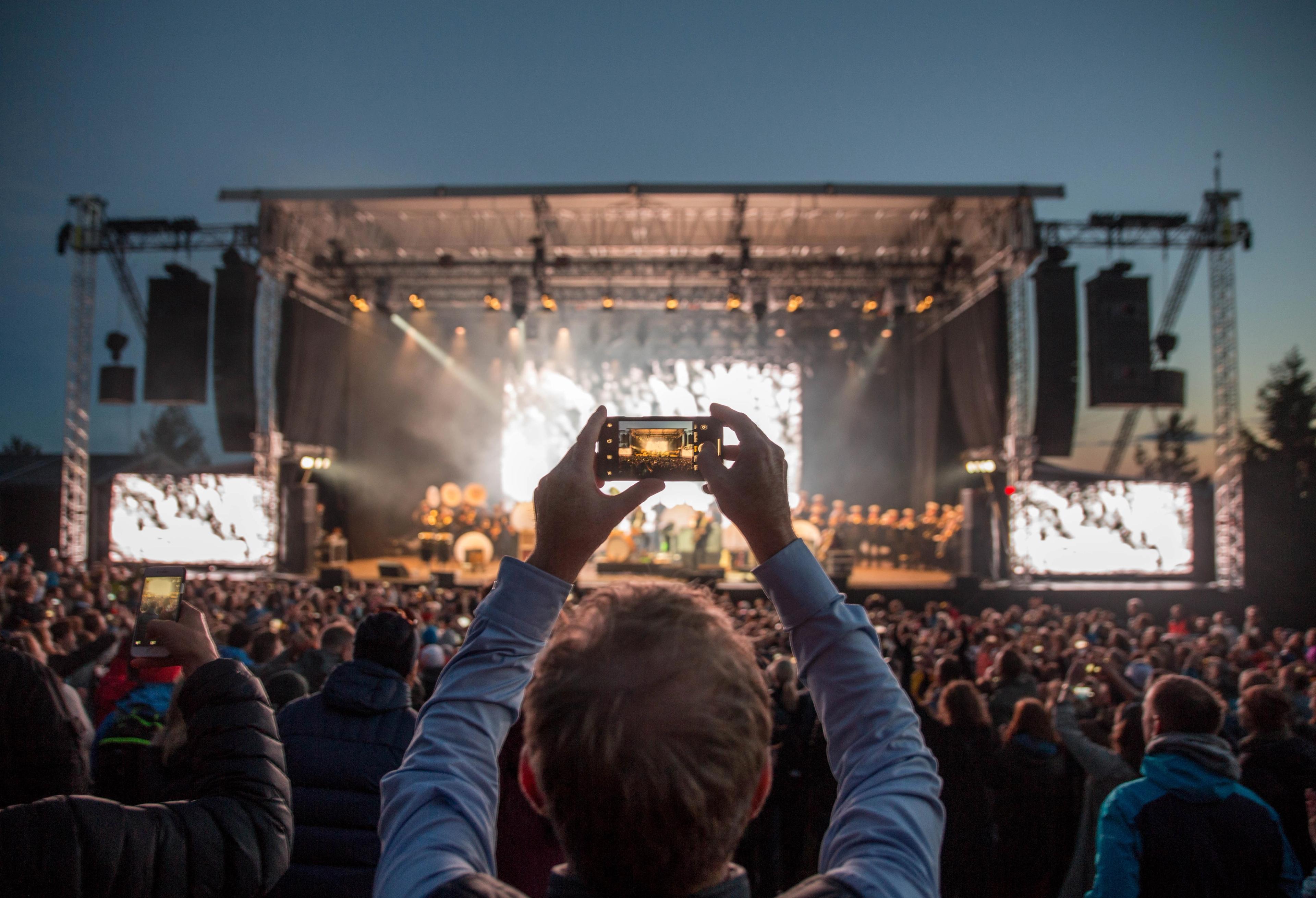 A large crowd in front of a stage at OverOslo music festival at Grefsenkollen in Oslo, Eastern Norway