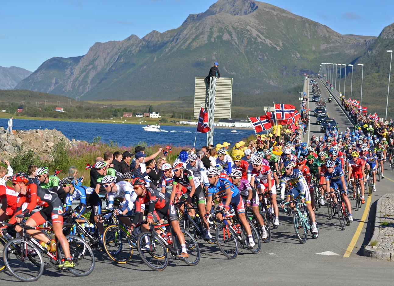 The peleton in the Arctic Race of Norway cycling over the Sortland bridge in Vesterålan, Northern Norway