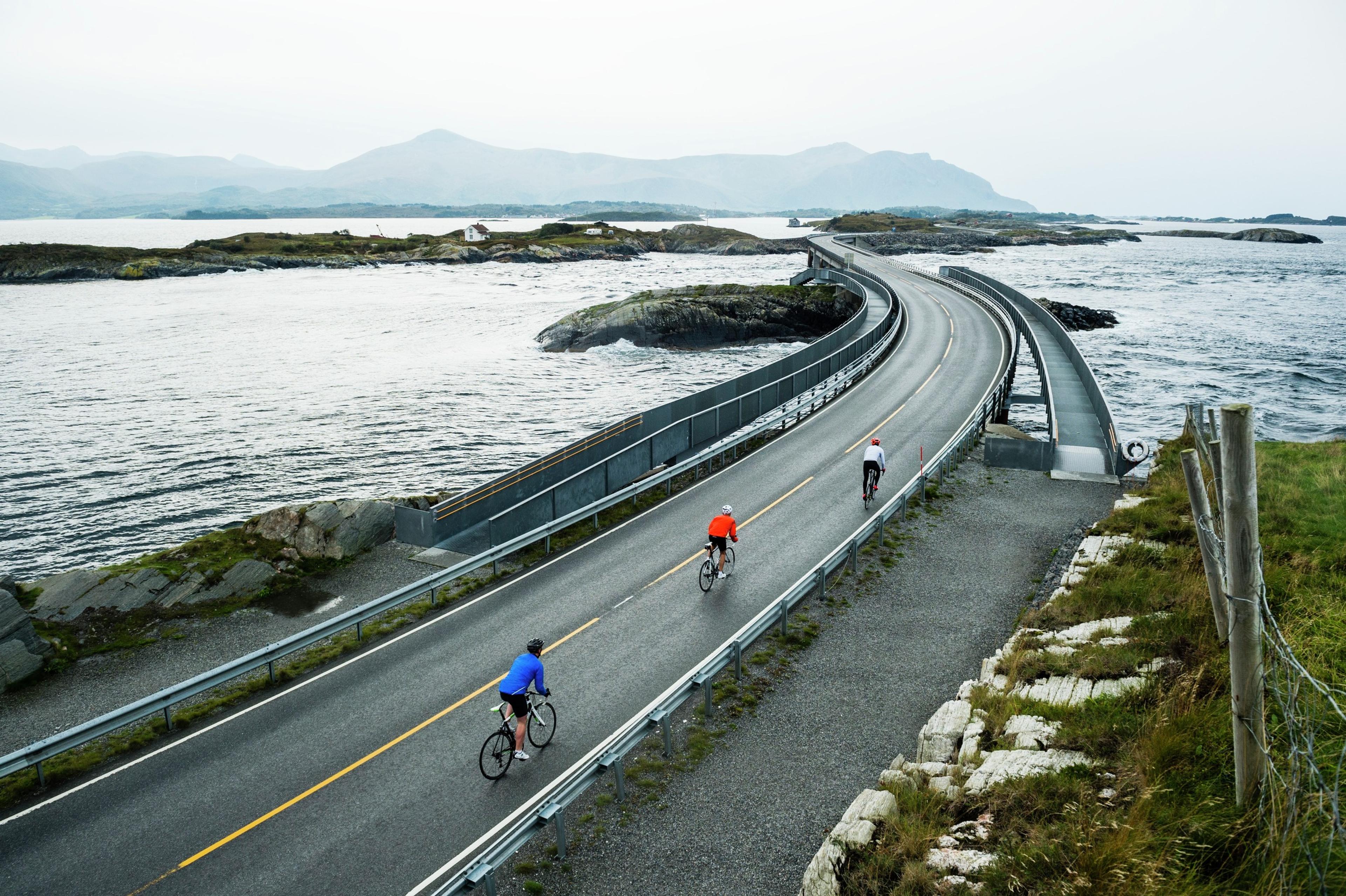 People cycling the Atlanterhavsvegen, the Atlantic road