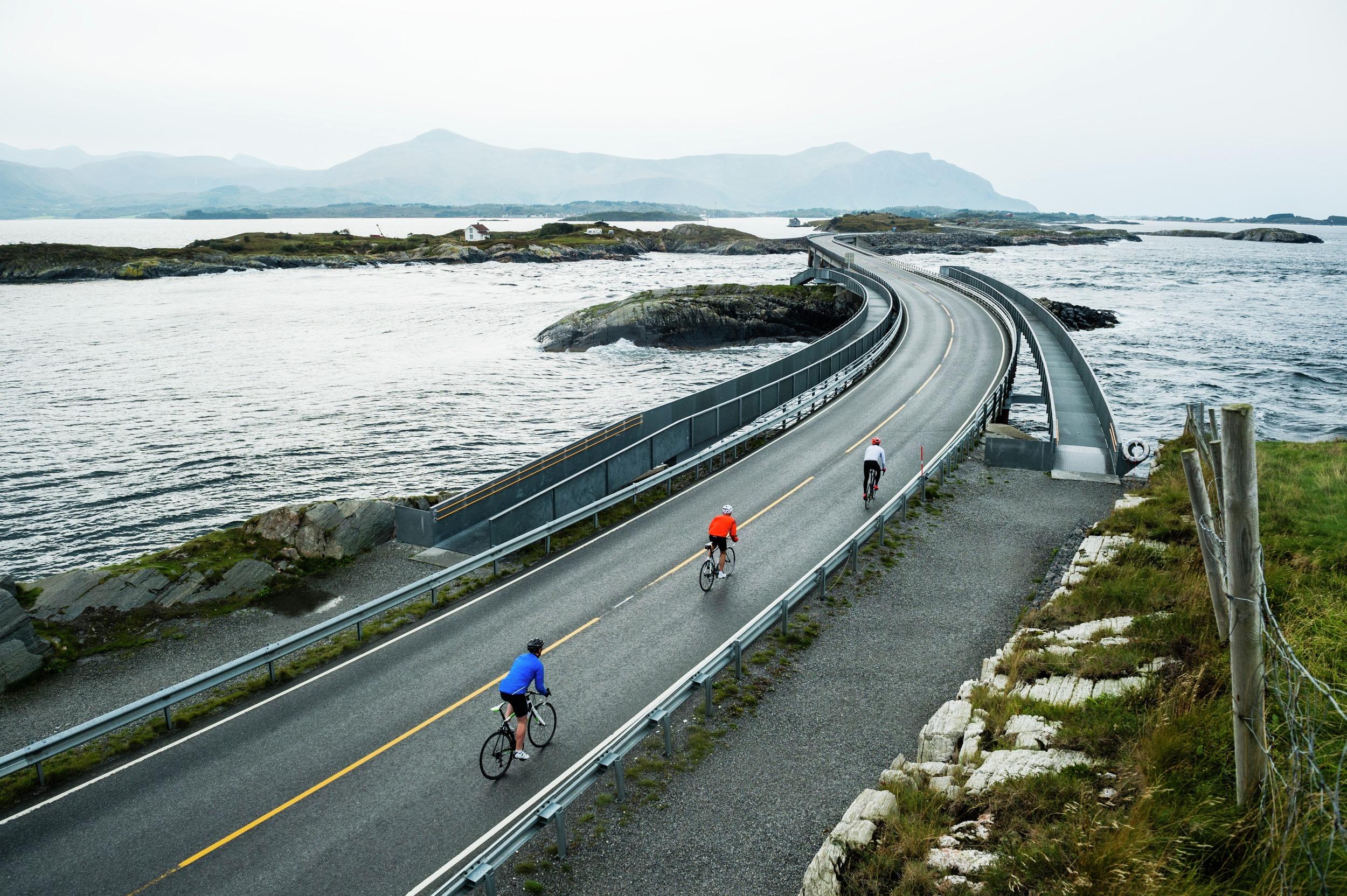 People cycling the Atlanterhavsvegen, the Atlantic road