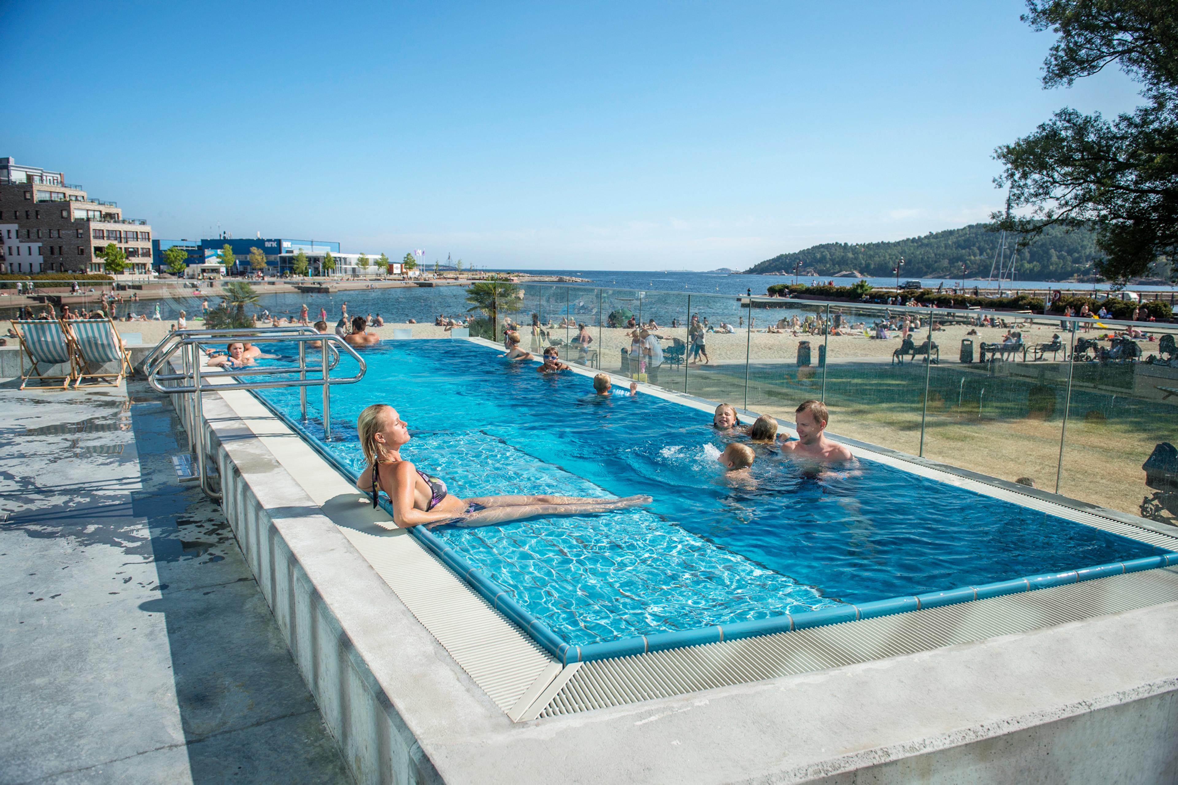 A woman resting in the outdoor pool at Aquarama in Kristiansand, Southern Norway