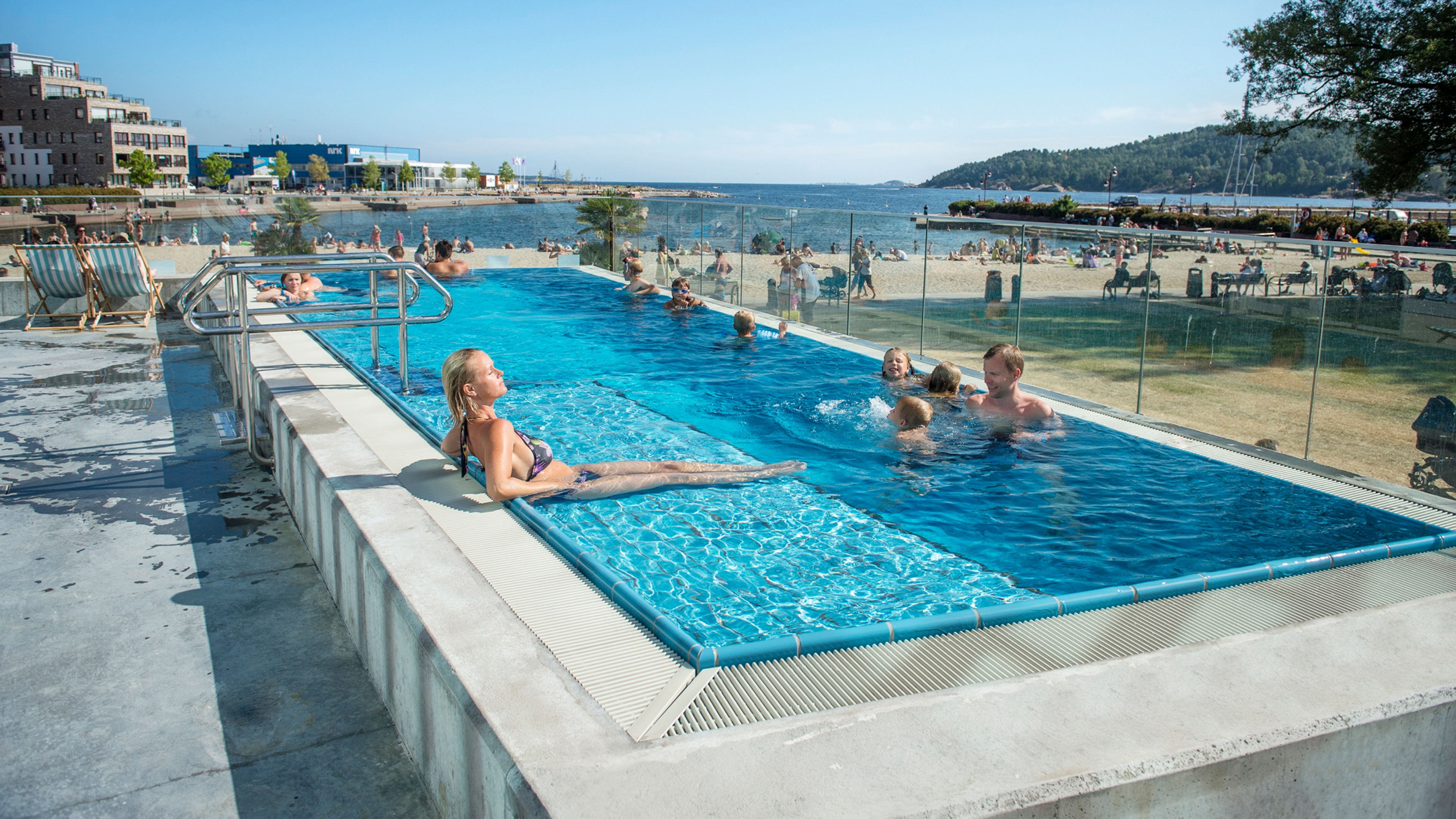 A woman resting in the outdoor pool at Aquarama in Kristiansand, Southern Norway