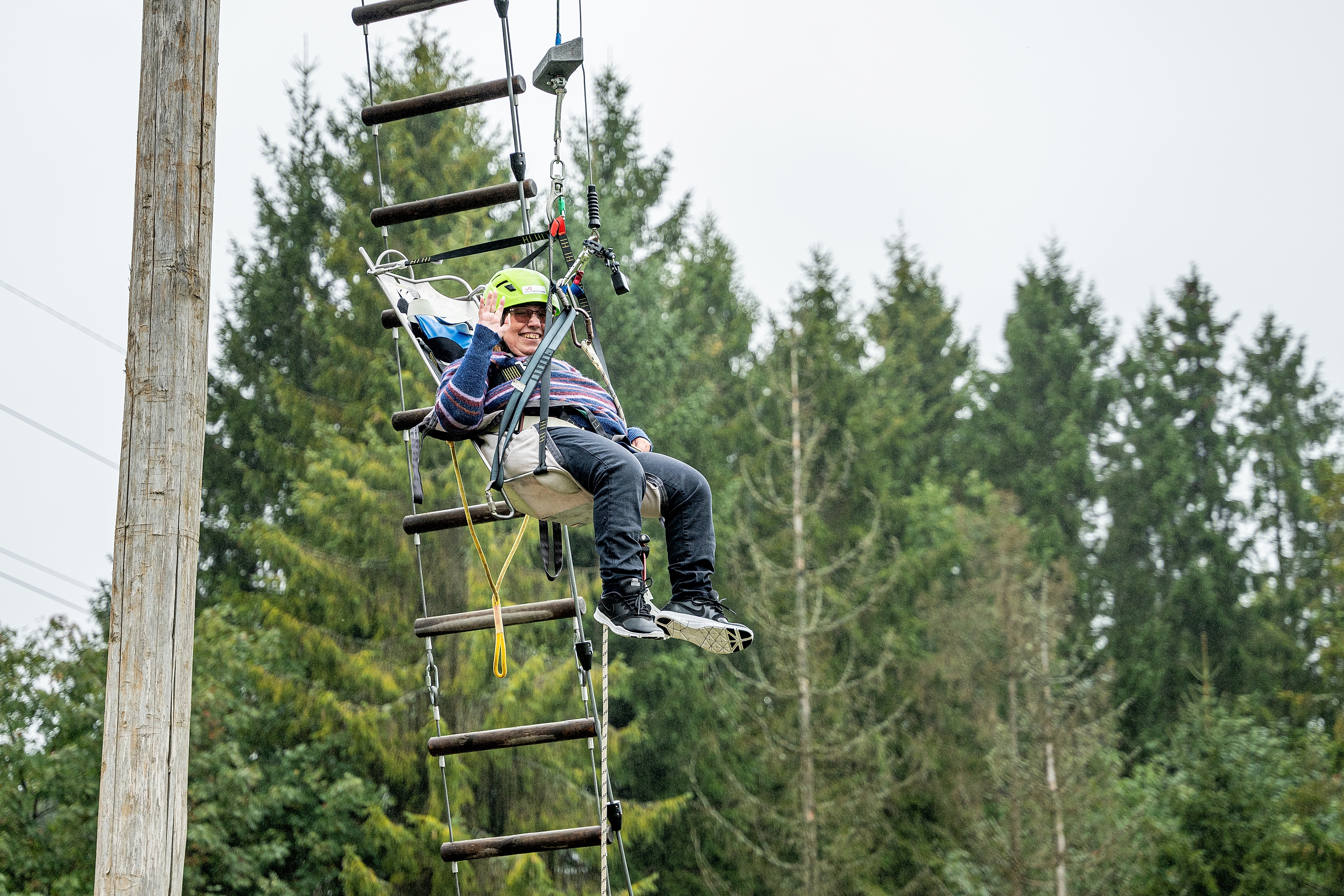 Woman tries accessible zip line in Skien Fritidspark, Telemark