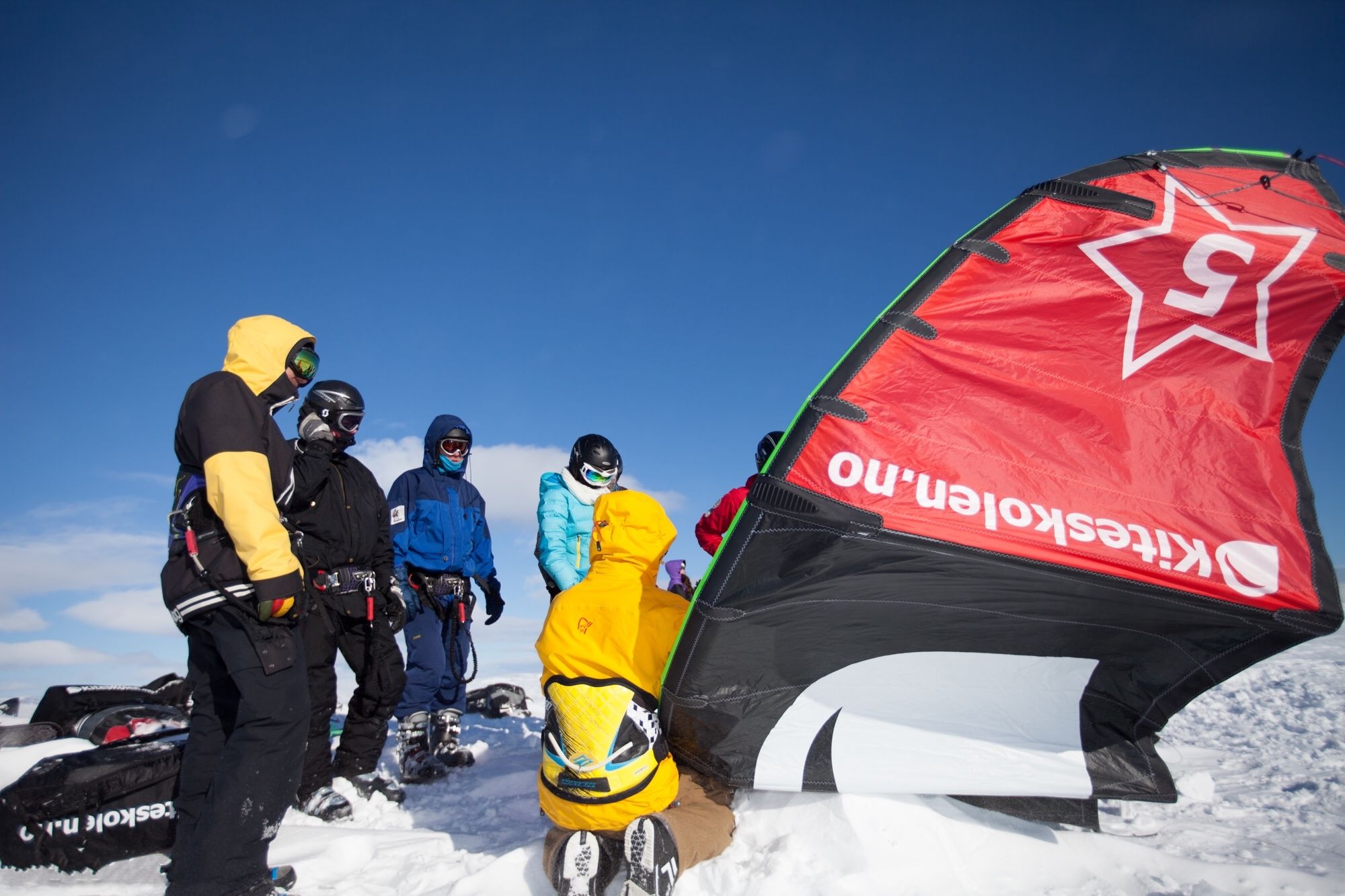 People learning to snowkite in Geilo, Eastern Norway