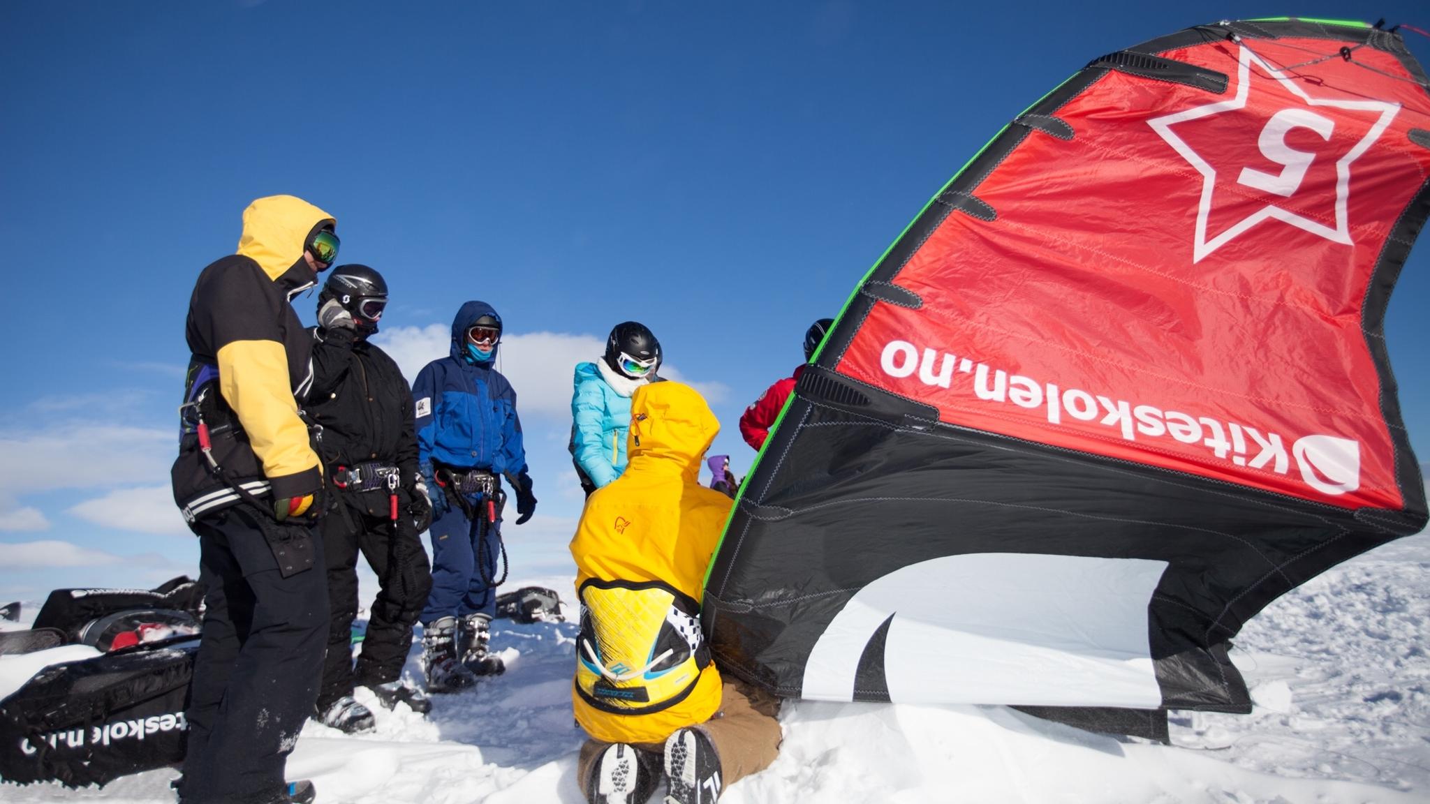 People learning to snowkite in Geilo, Eastern Norway