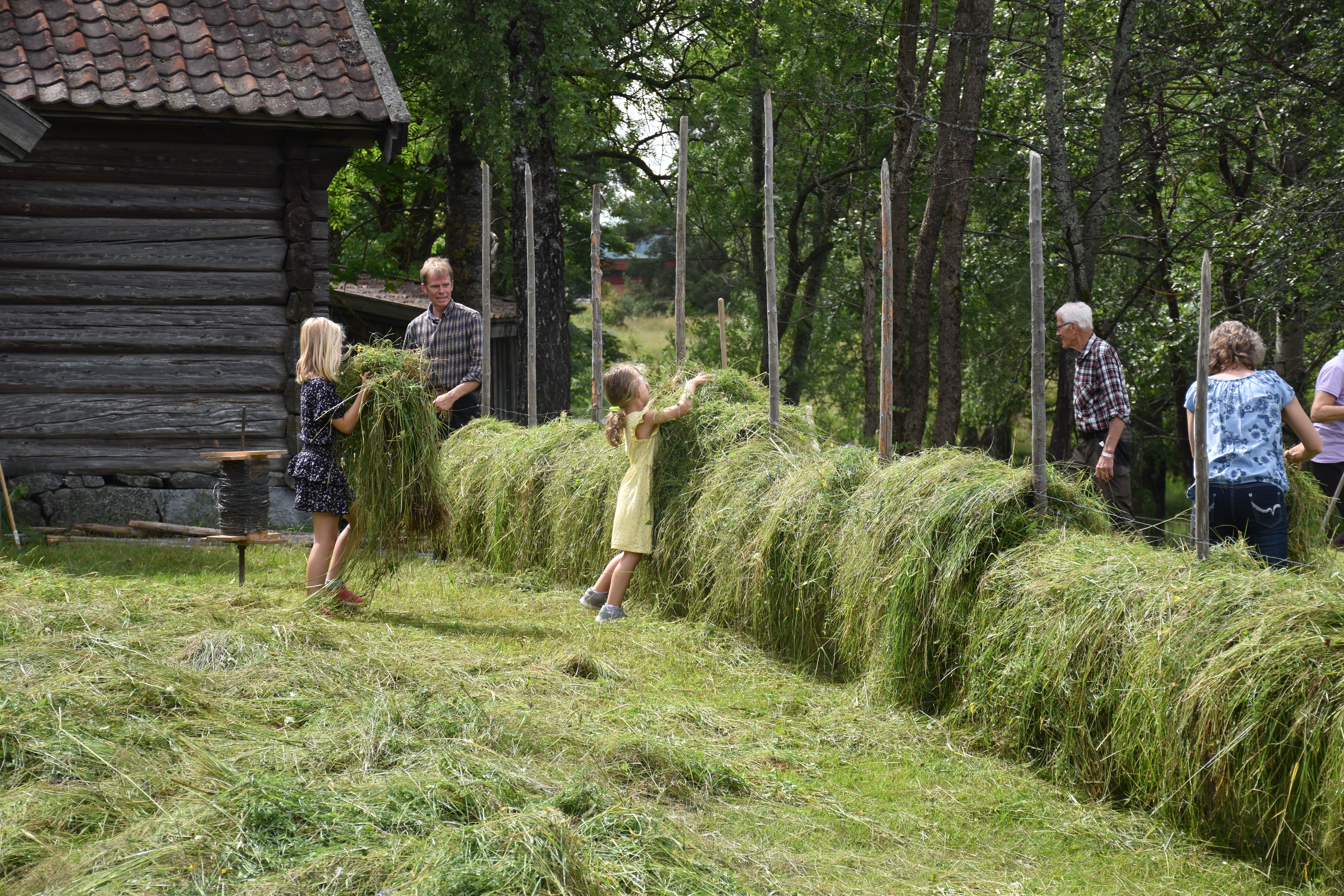 Visitors at the Lågdal Museum having fun.