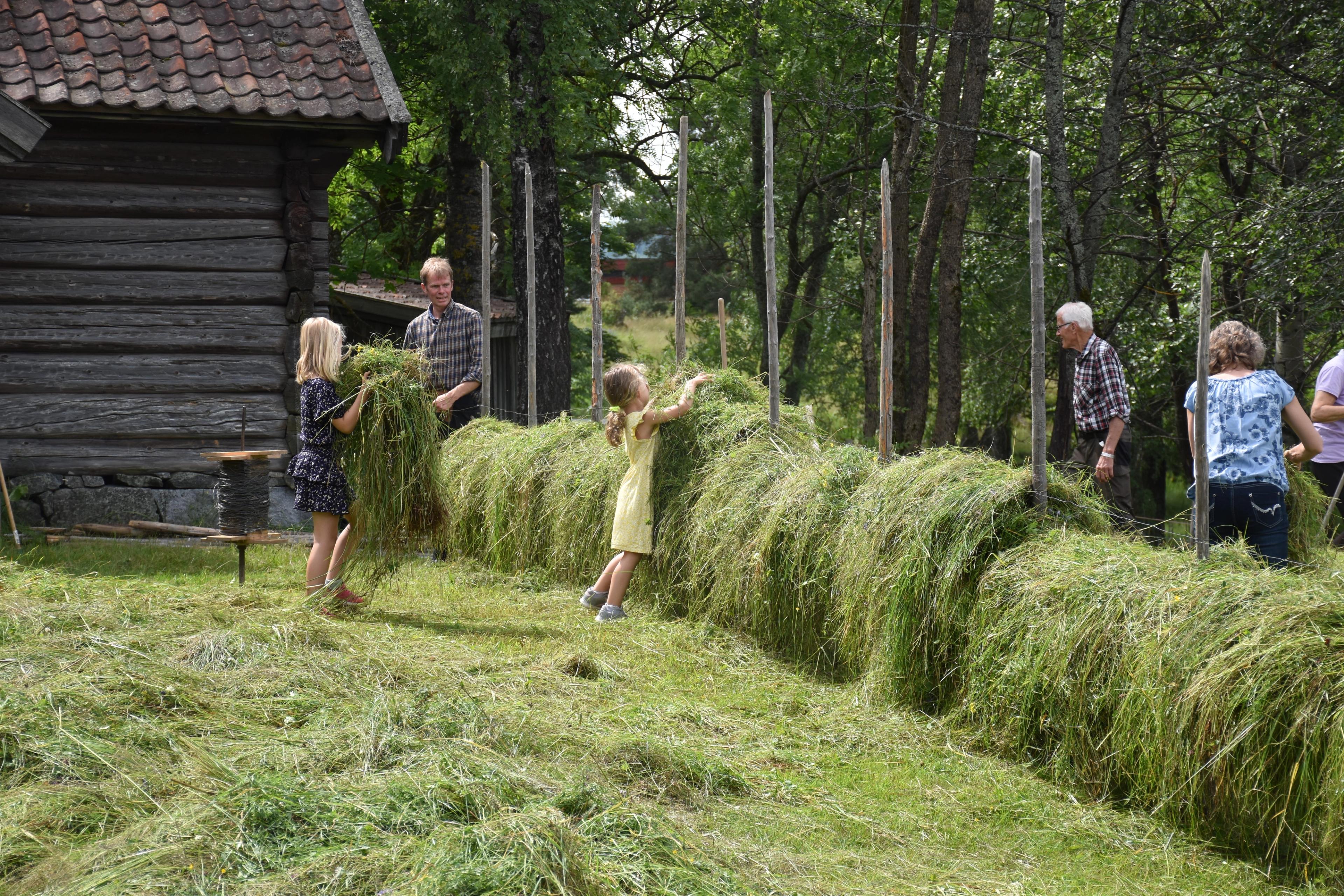 Visitors at the Lågdal Museum having fun.