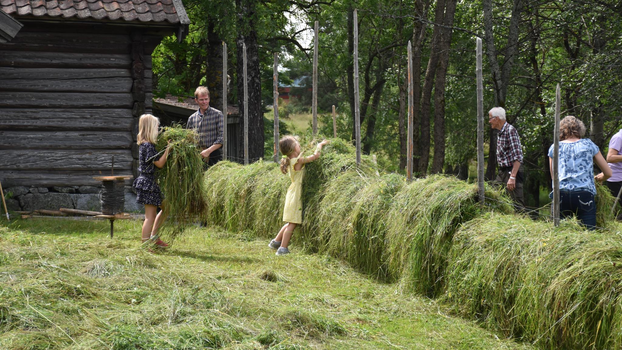 Visitors at the Lågdal Museum having fun.