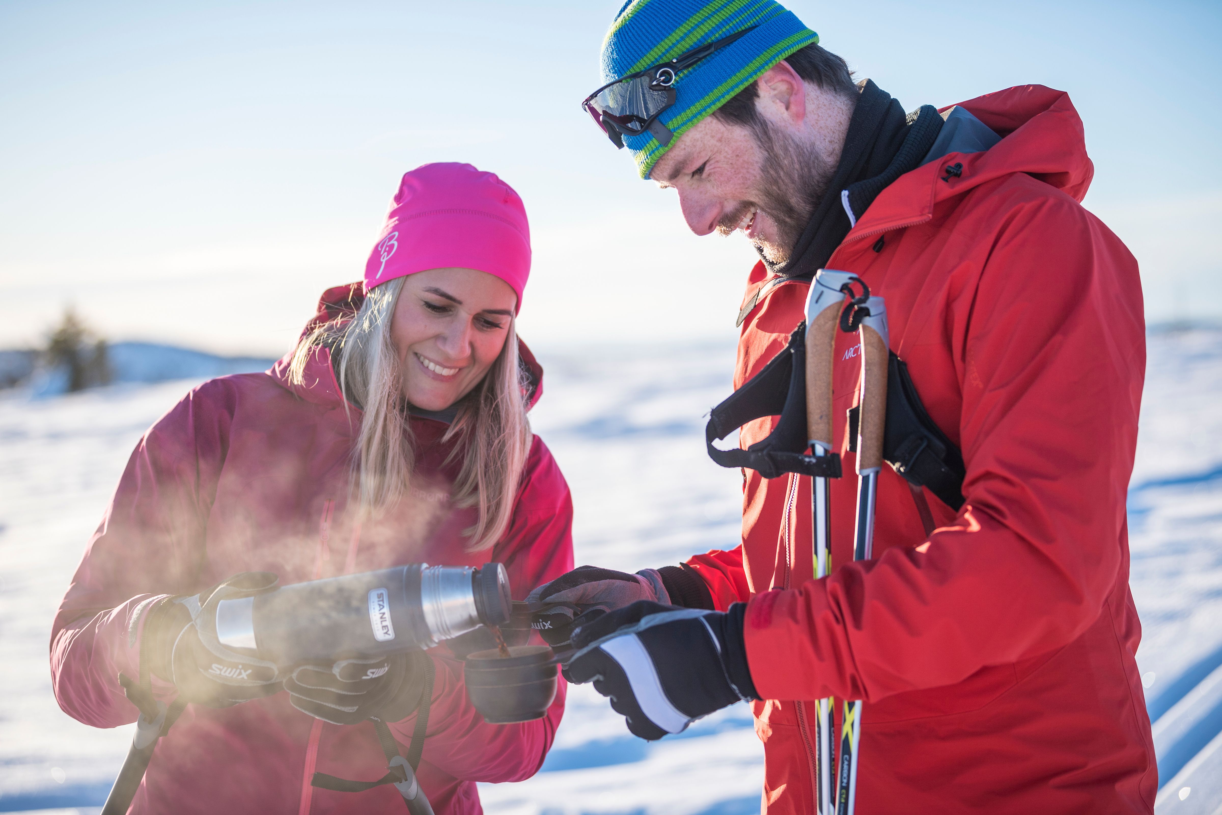 Couple enjoying a break from cross-country skiing in Valdres, Eastern Norway