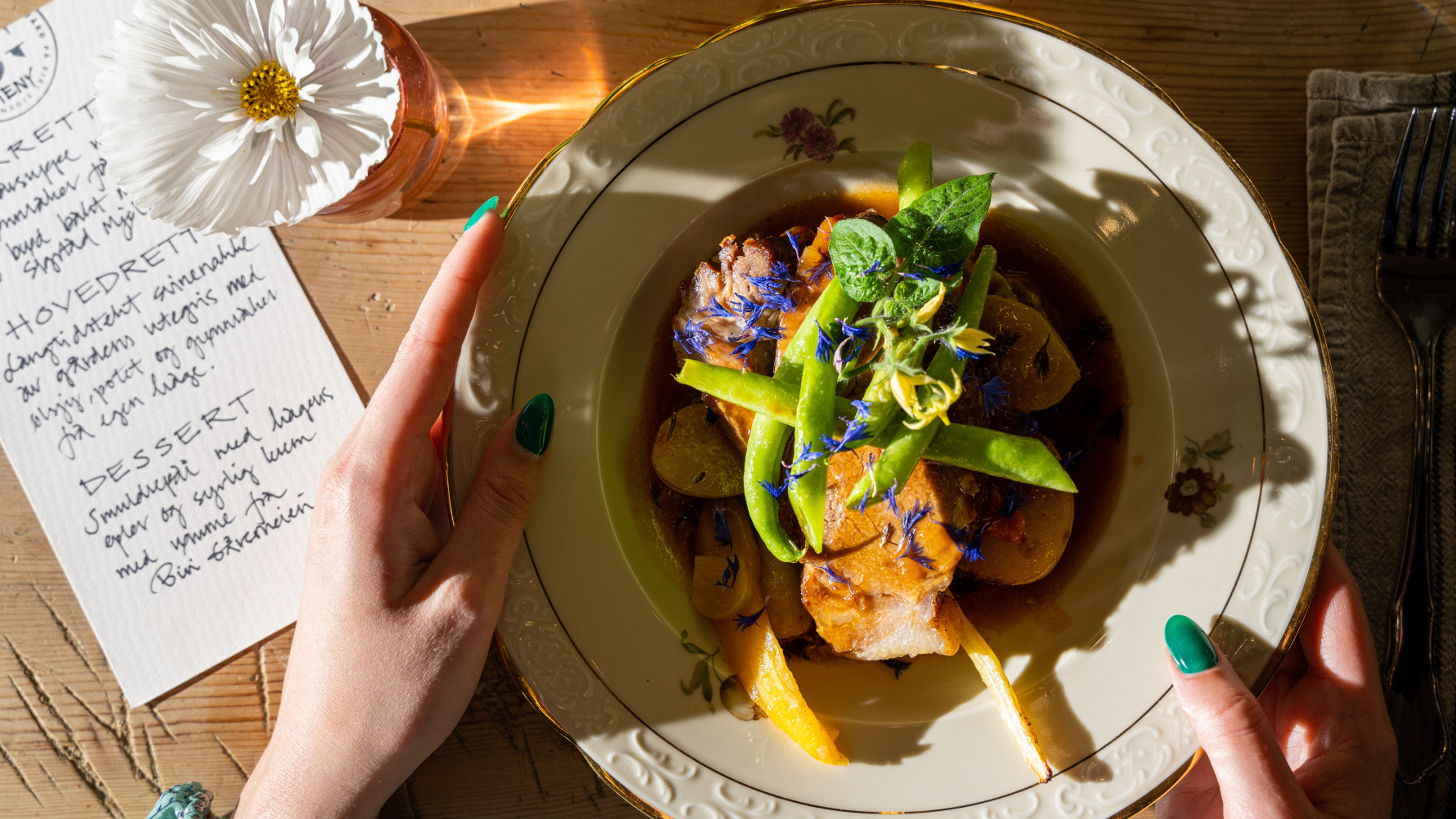 Pork dish with flower decoration.