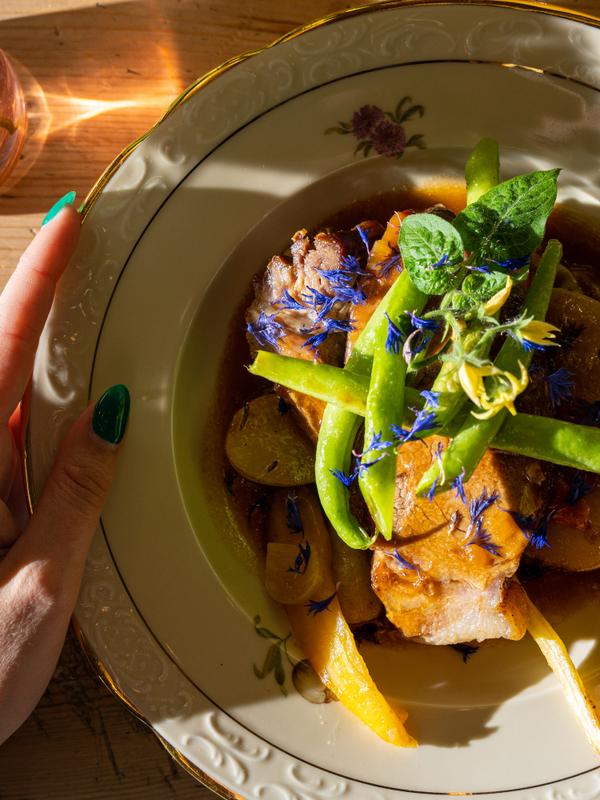 Pork dish with flower decoration.