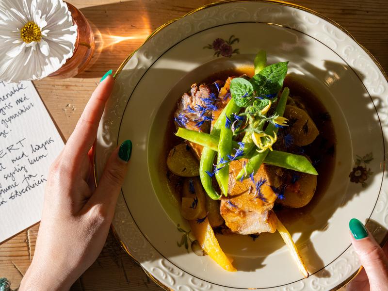 Pork dish with flower decoration.