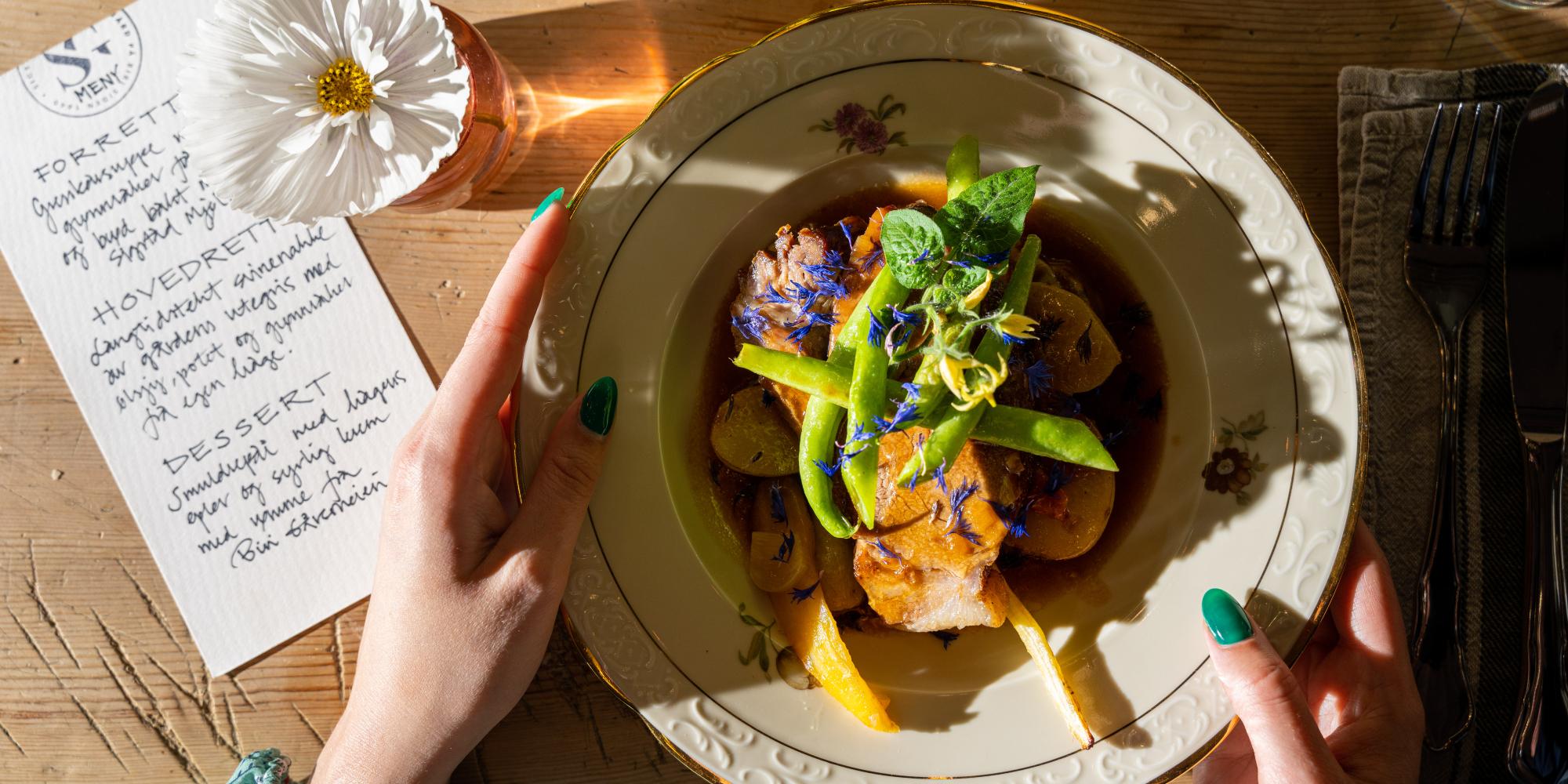 Pork dish with flower decoration.