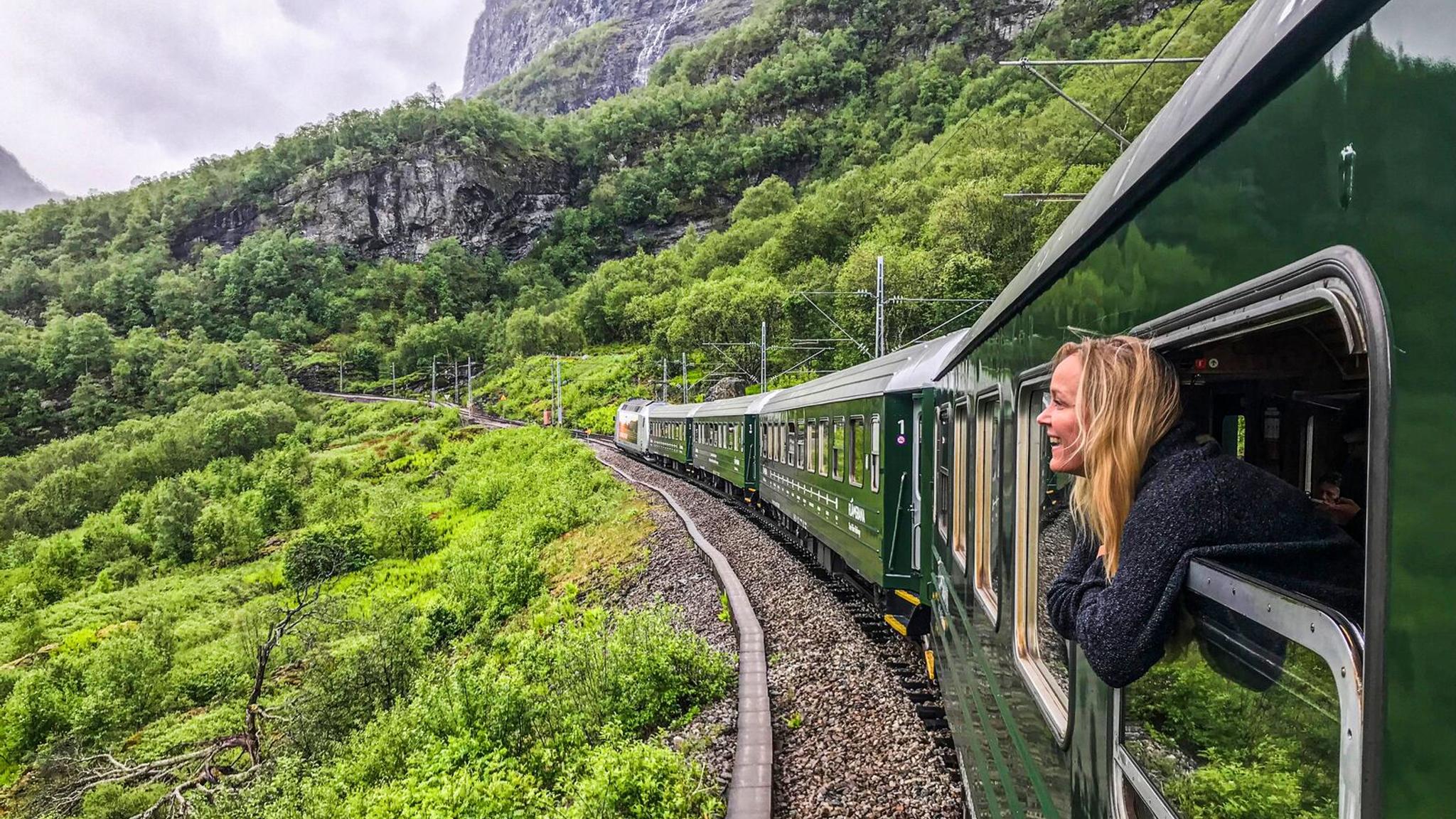 A woman traveling with Flåm railway