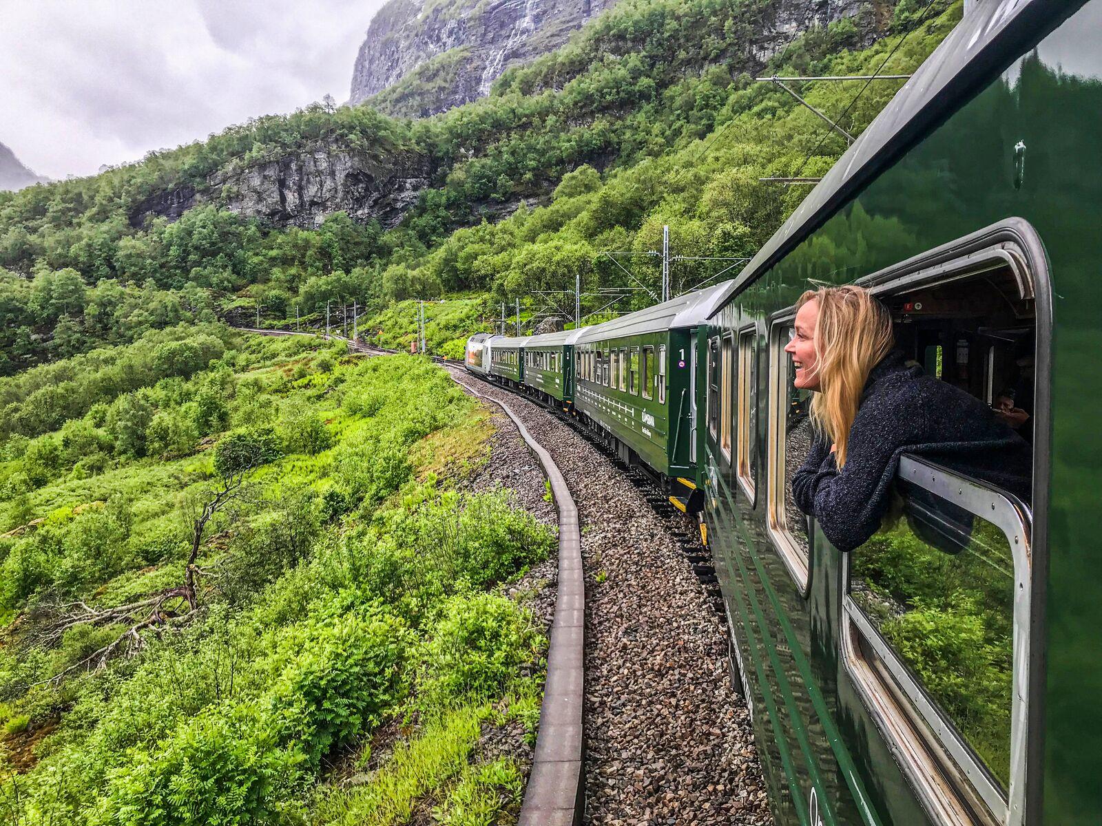 A woman traveling with Flåm railway