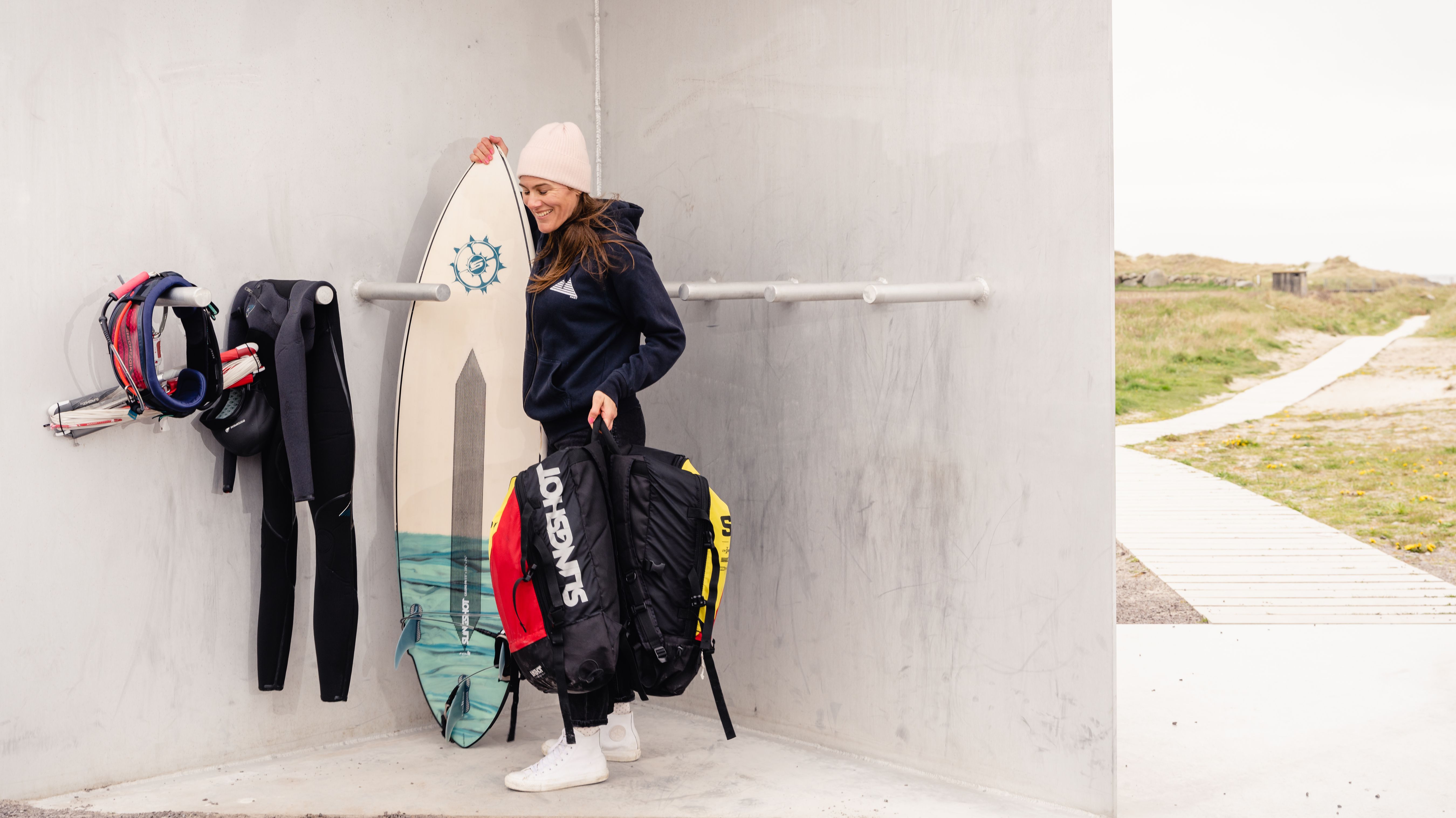 A woman getting ready to go water kiting at Jæren, the Stavanger Region, Fjord Norway.