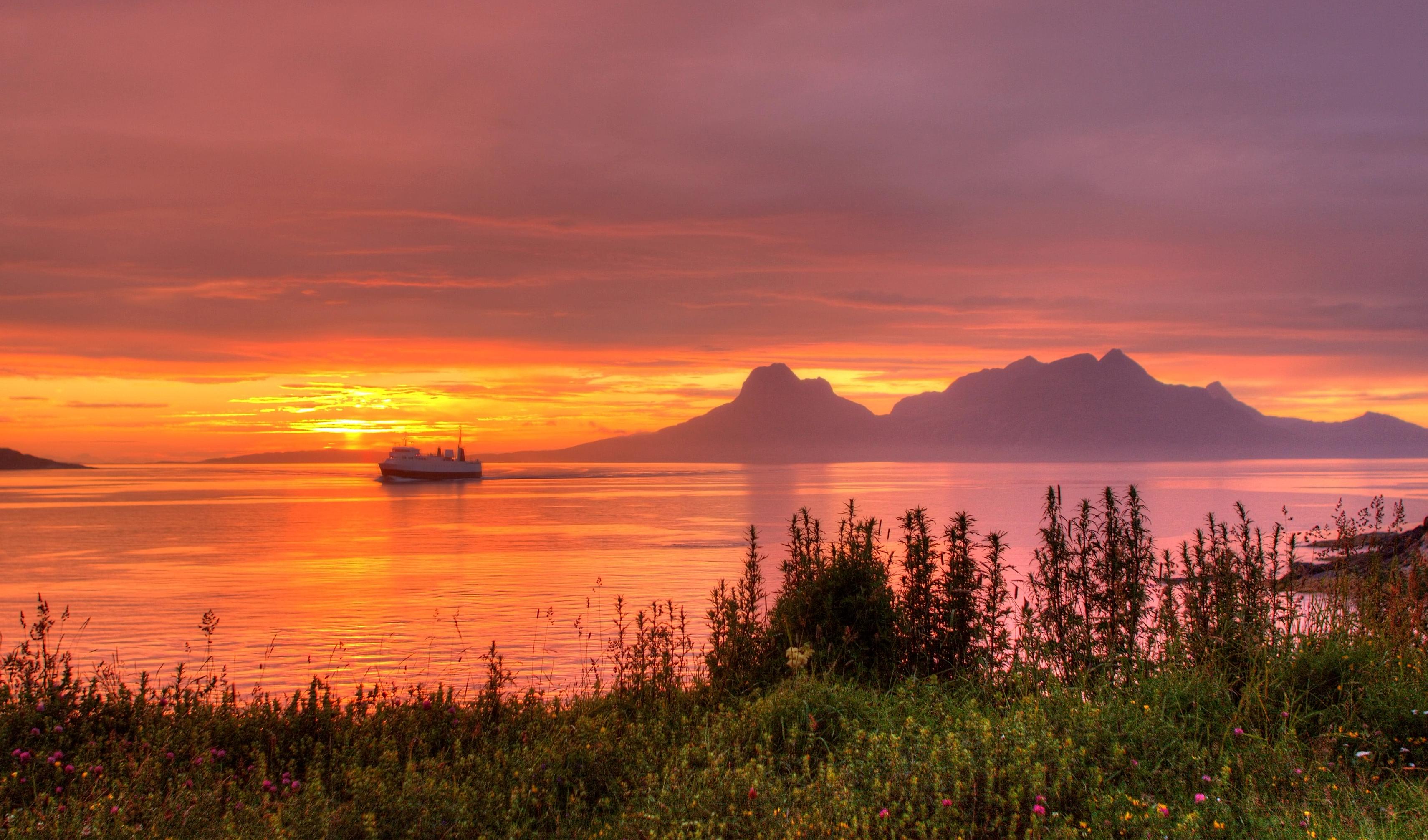 The sea under the midnight sun near Bodø, Salten, Northern Norway