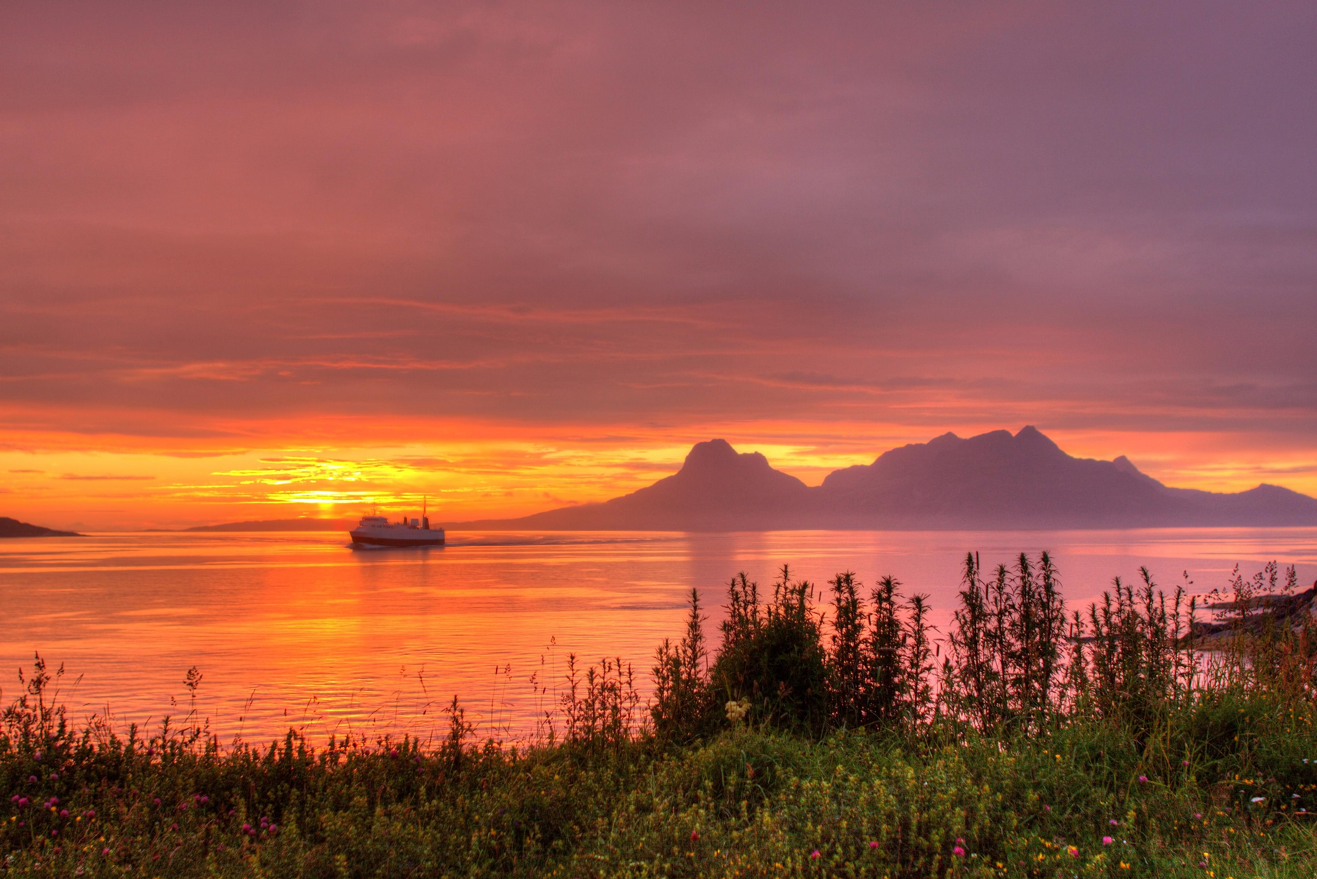 The sea under the midnight sun near Bodø, Salten, Northern Norway