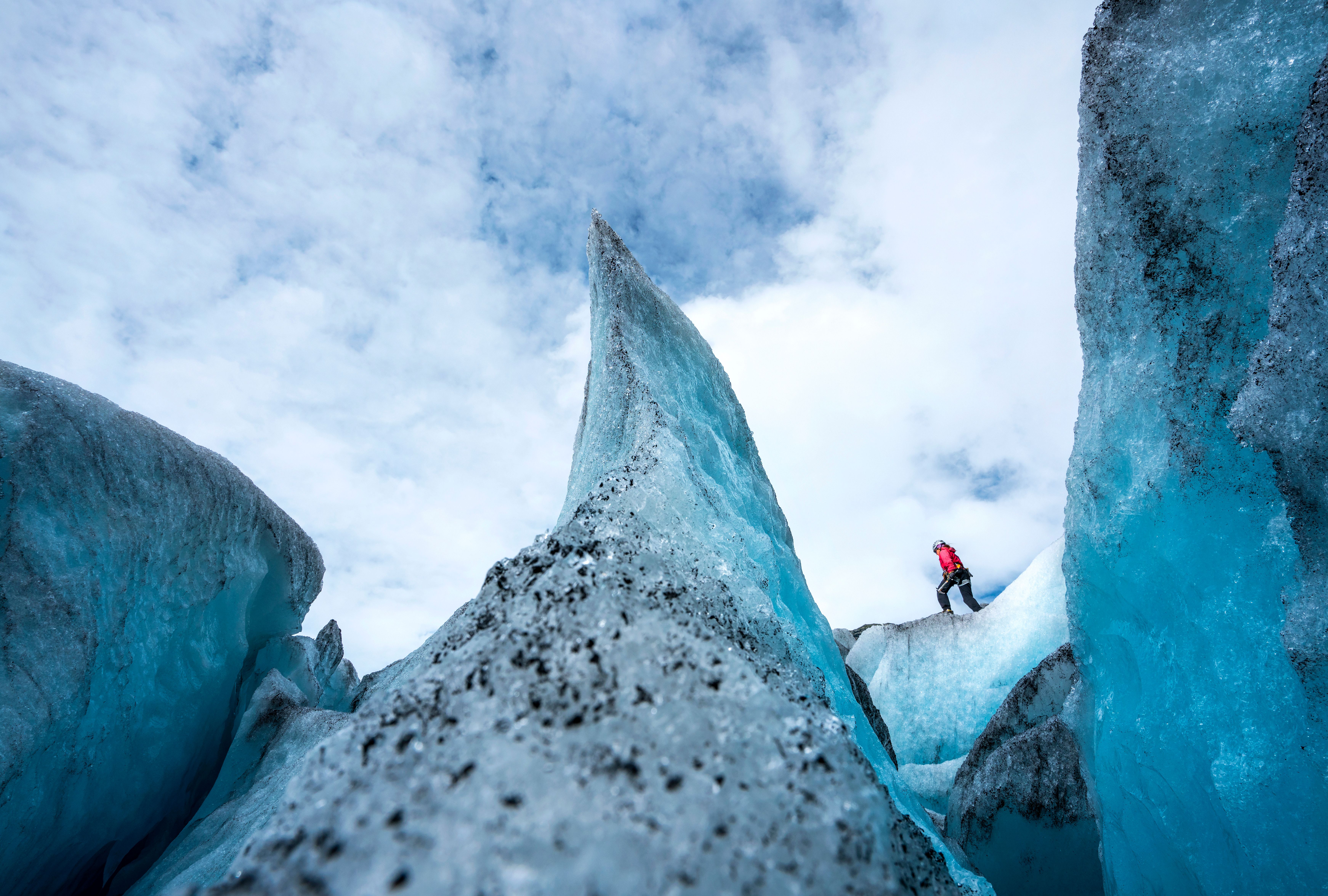 A person is hiking on the Nigardsbreen glacier in the Jostedalen valley in the Sognefjord area of Fjord Norway