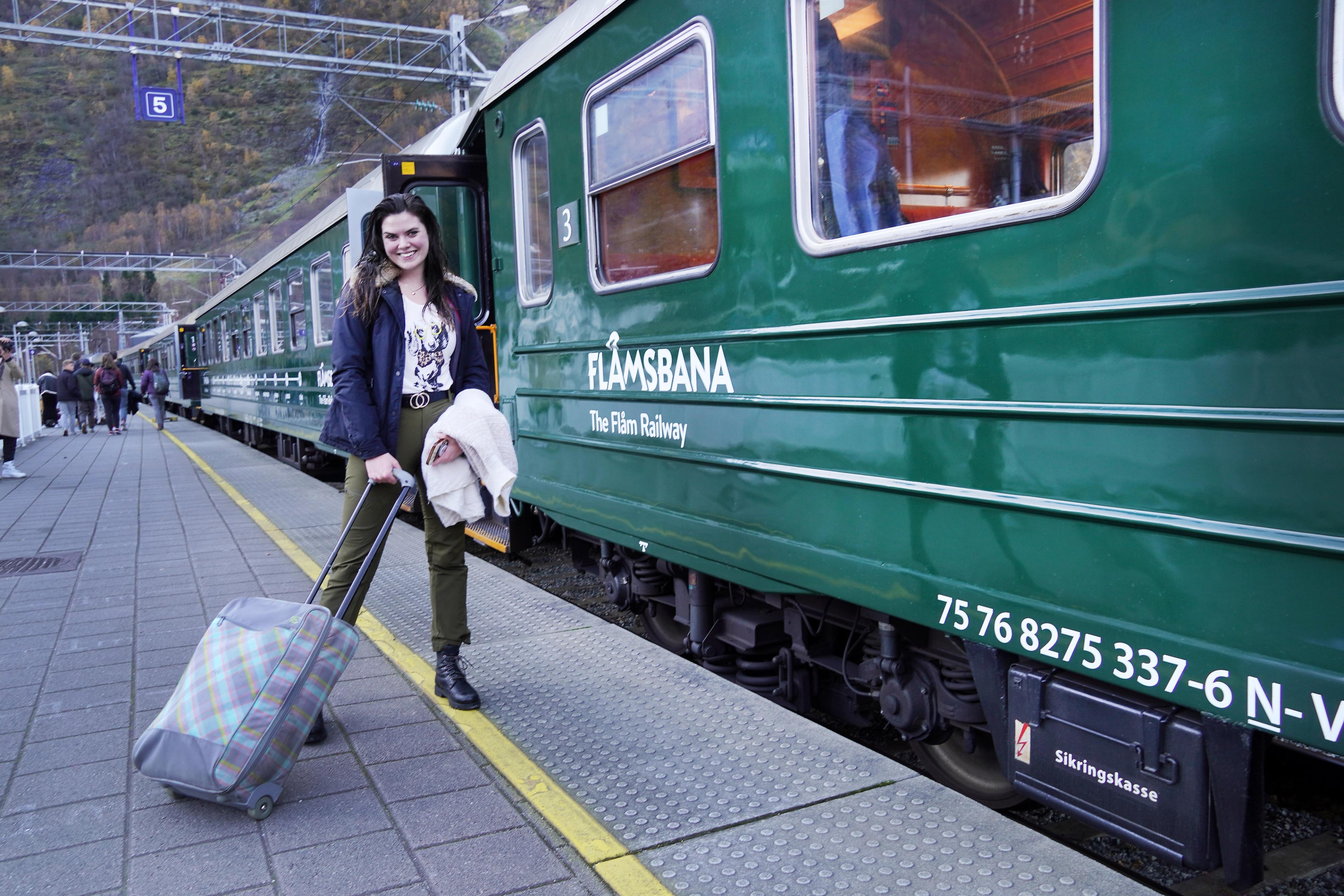 Women with a suitcase going to the flam train