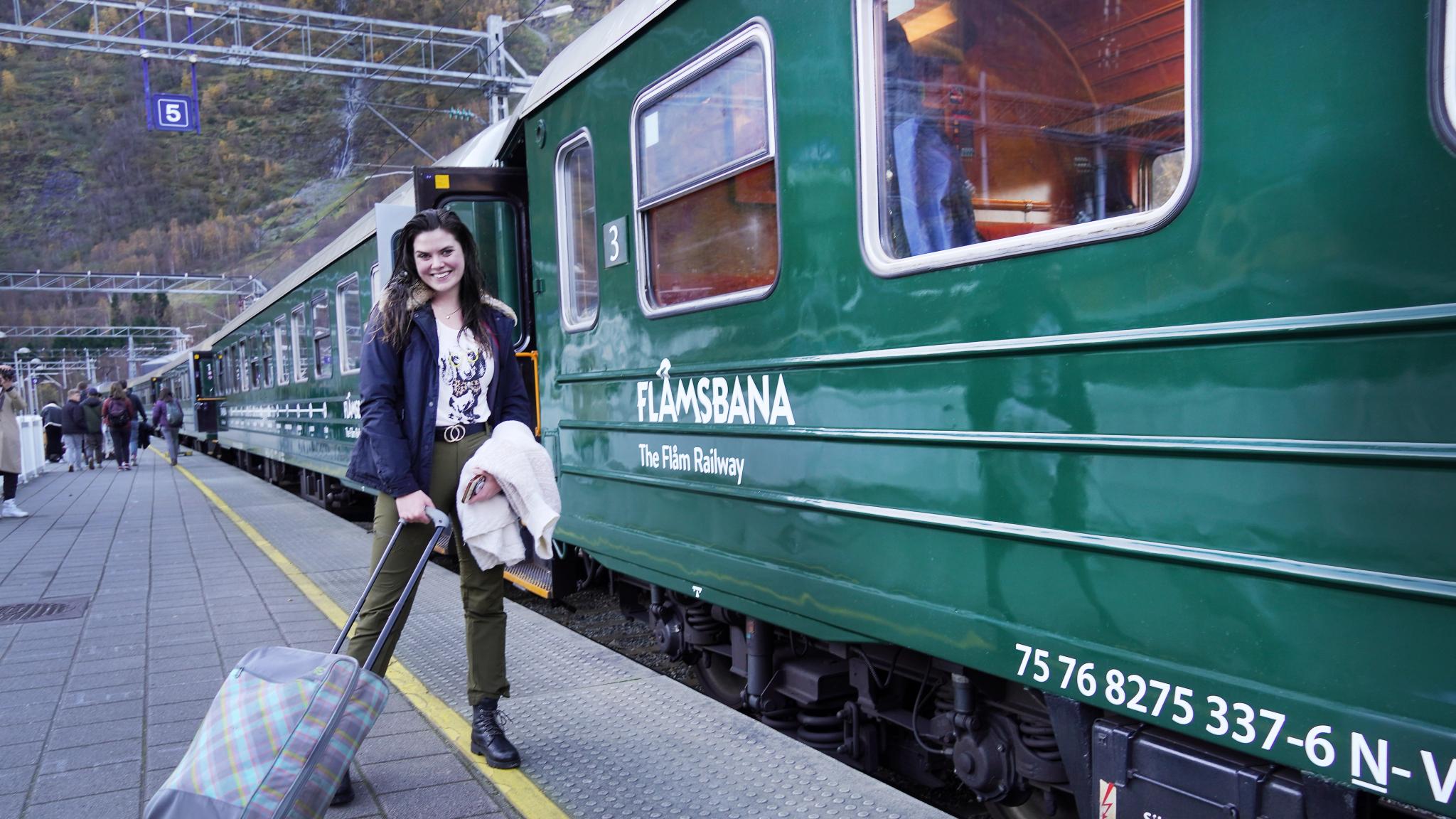 Women with a suitcase going to the flam train