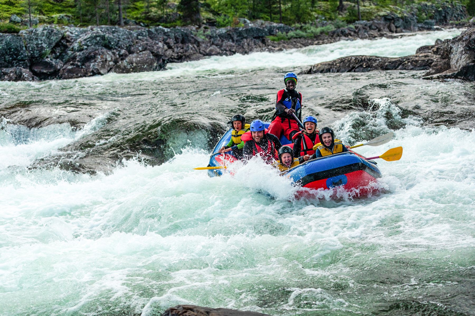 Family white water rafting in Geilo, Eastern Norway