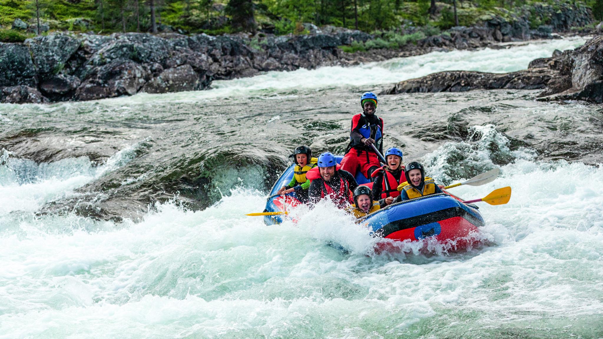 Family white water rafting in Geilo, Eastern Norway