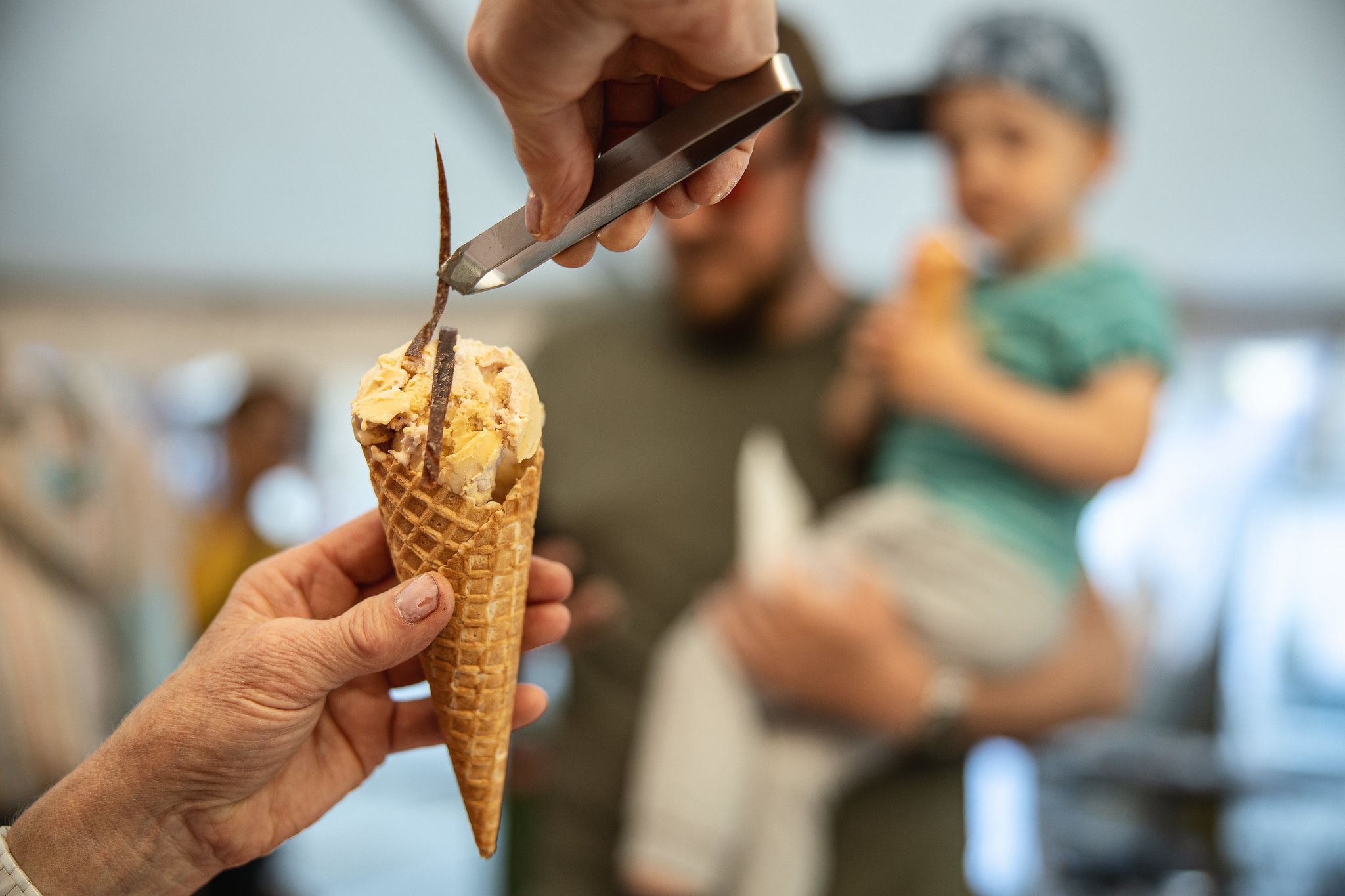 Father and son getting served ice cream at the Trøndelag food festival in Trondheim