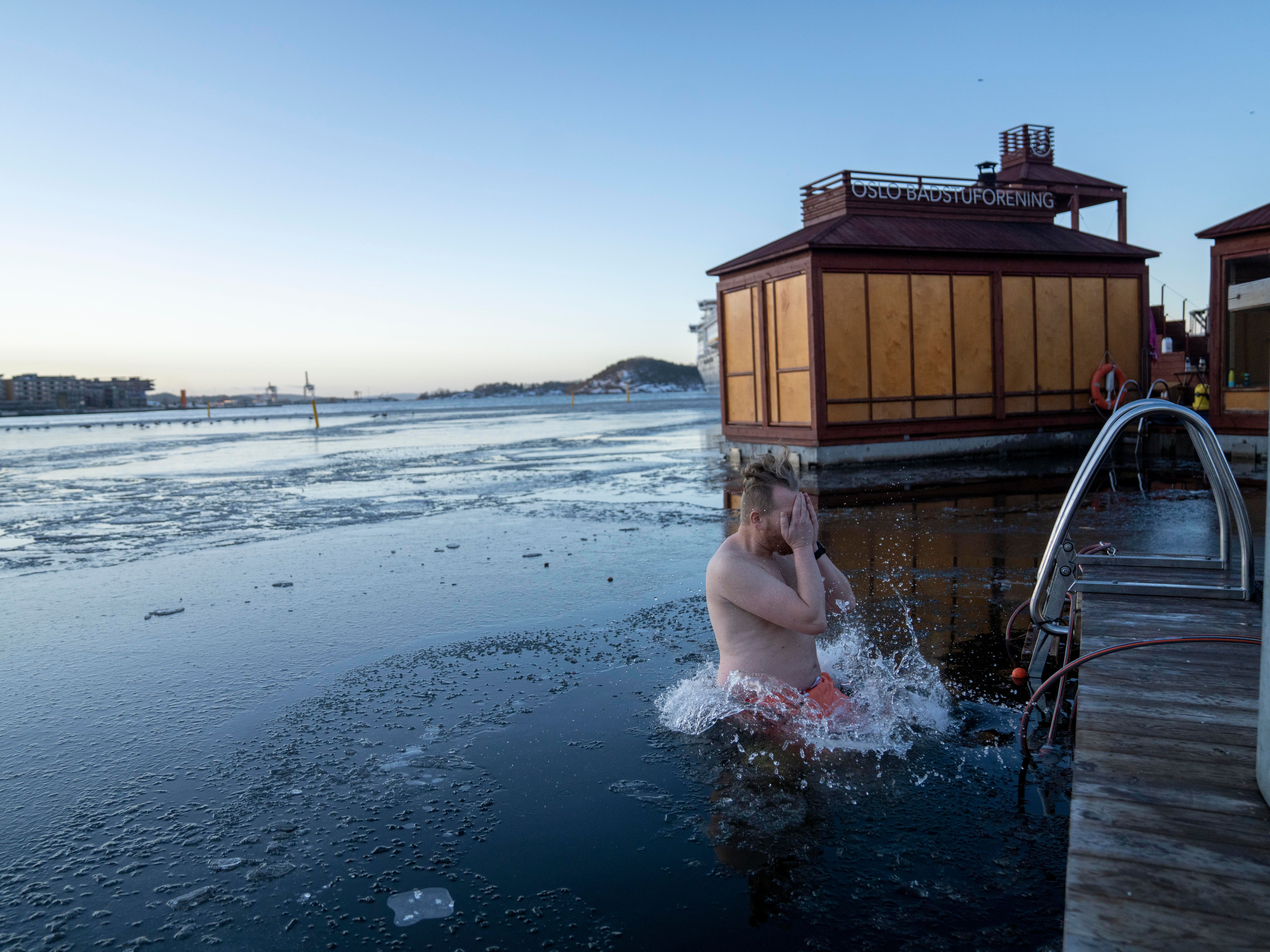 A man ice bathing in the Oslofjord, Oslo, Eastern Norway