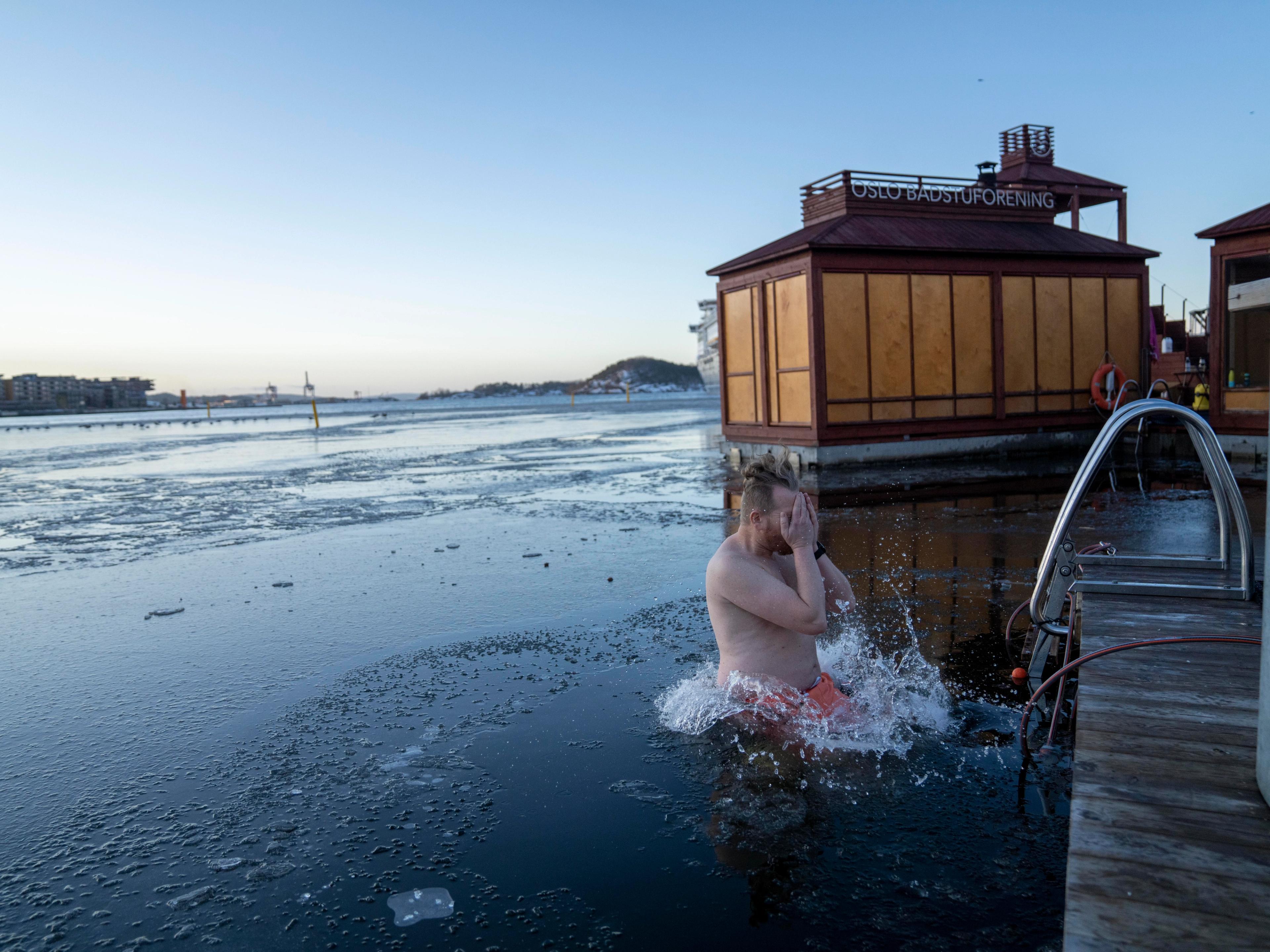 A man ice bathing in the Oslofjord, Oslo, Eastern Norway