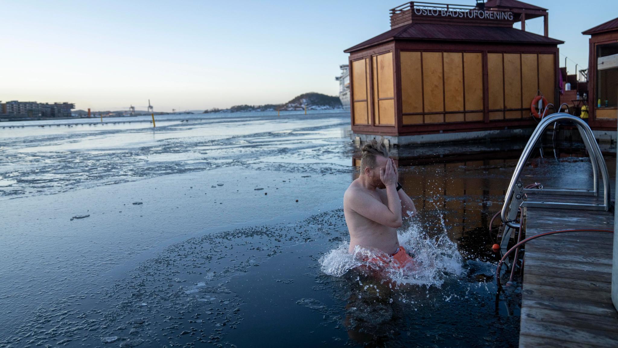 A man ice bathing in the Oslofjord, Oslo, Eastern Norway