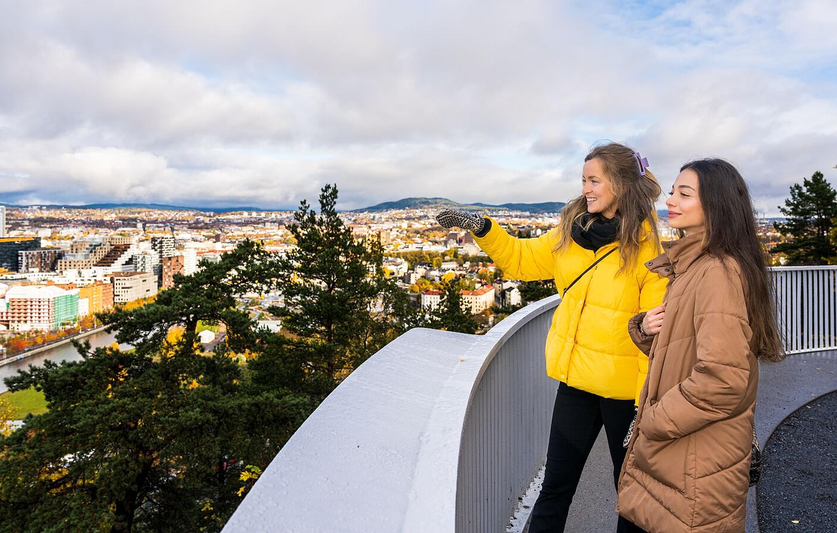 Two women looking at the view from Ekeberg in Oslo.