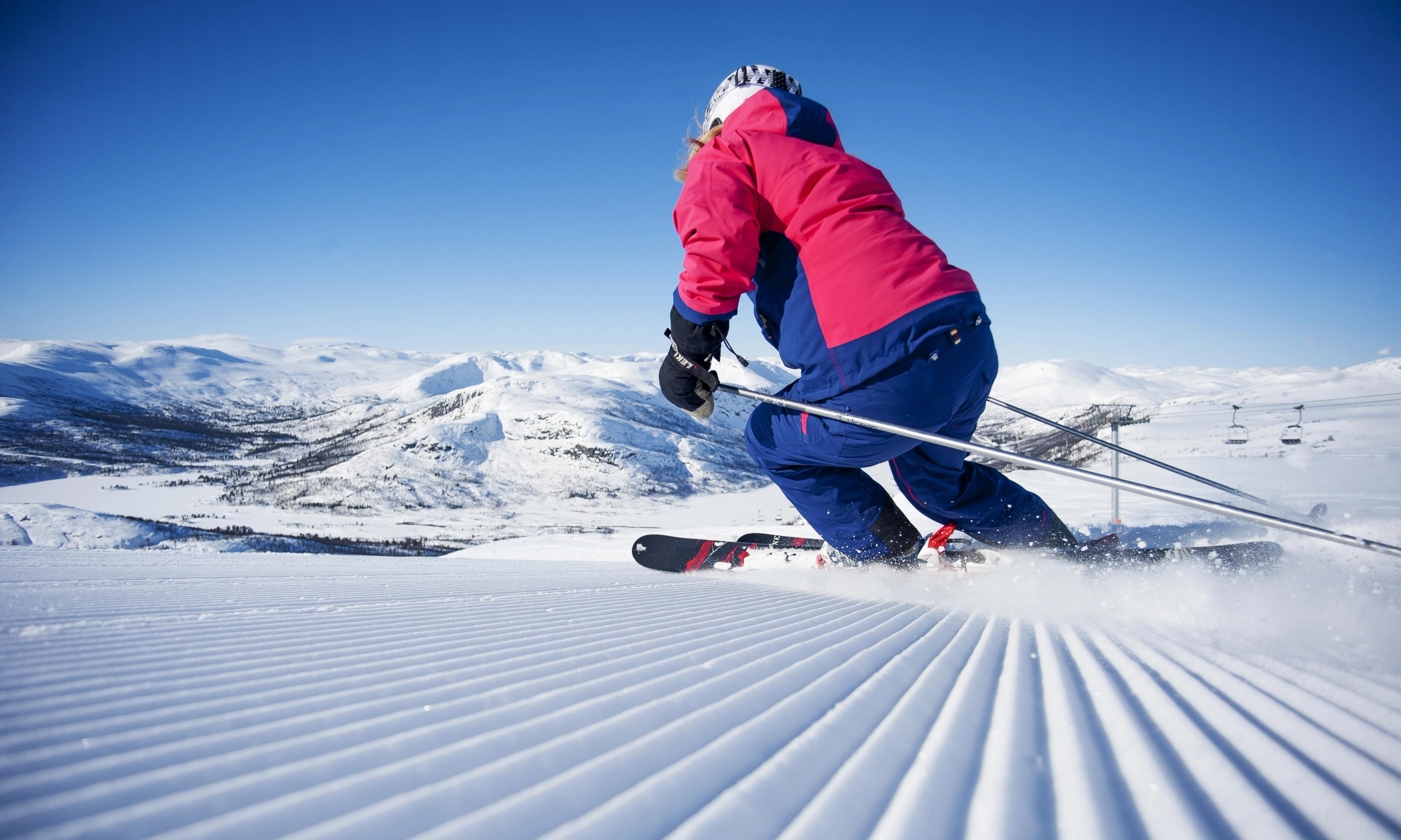 A person alpine skiing in Hovden in Setesdal, Southern Norway