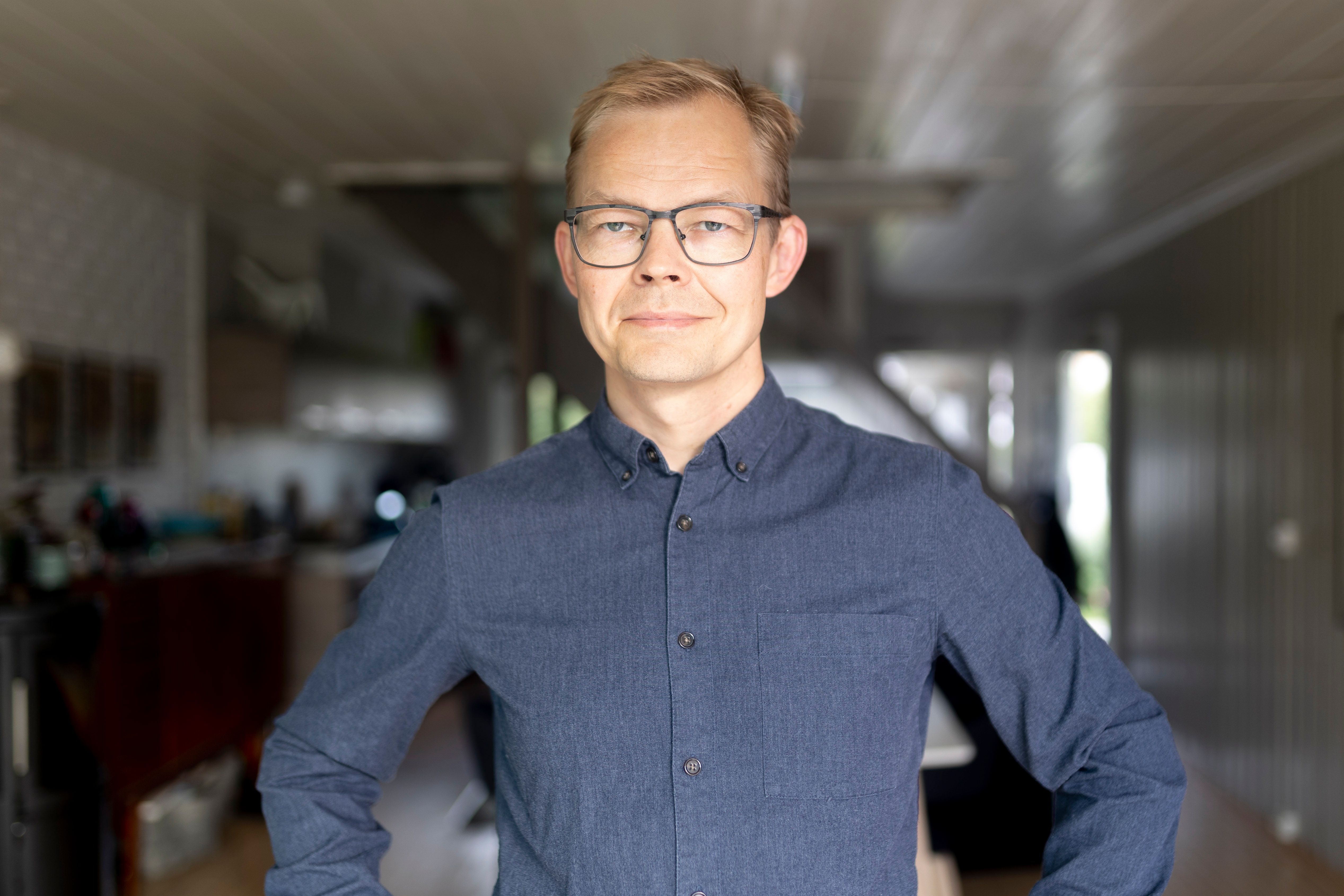 Sami director with glasses