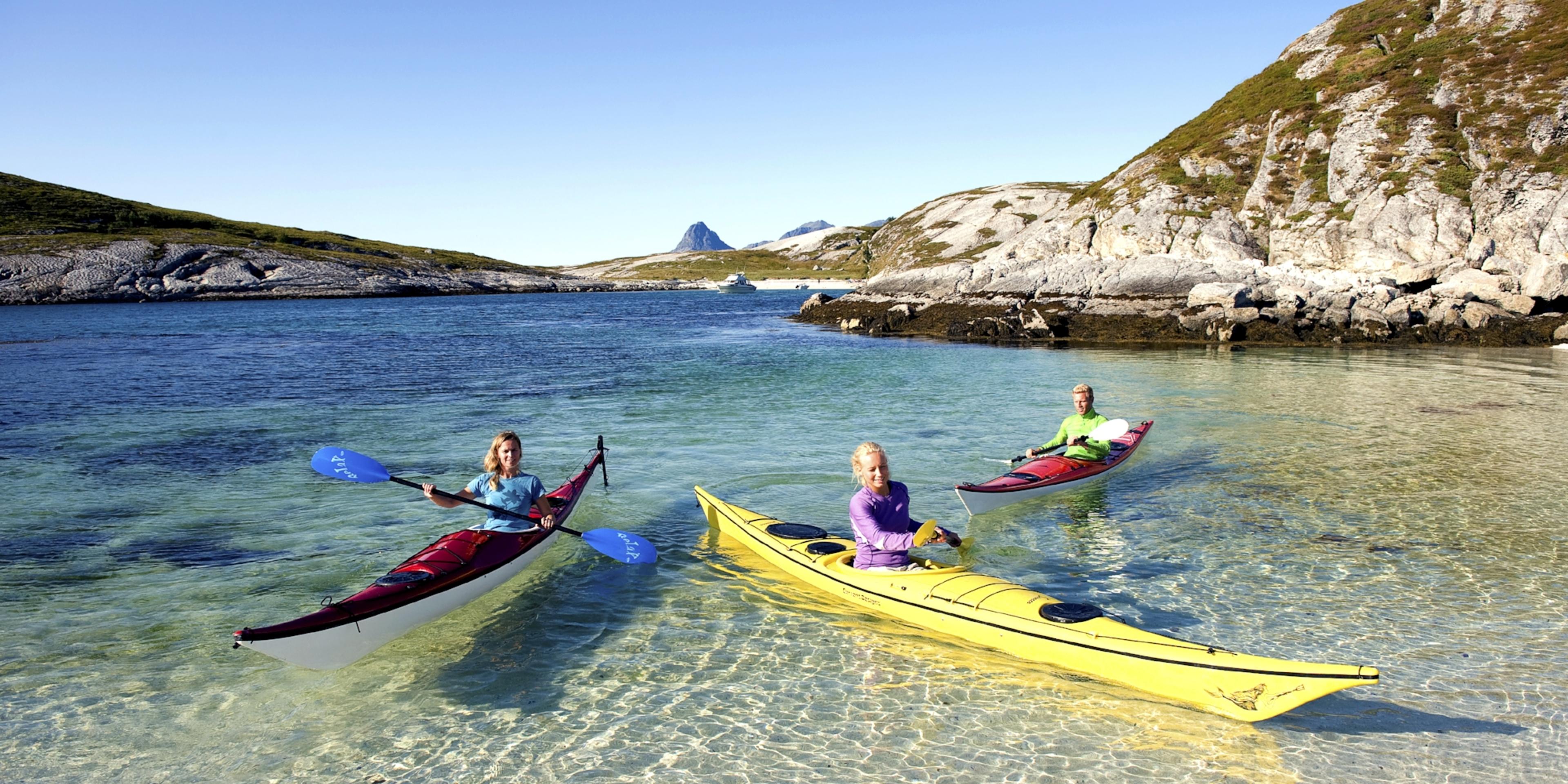 Three kayaks at Store Hjartøya near Bodø, Northern Norway