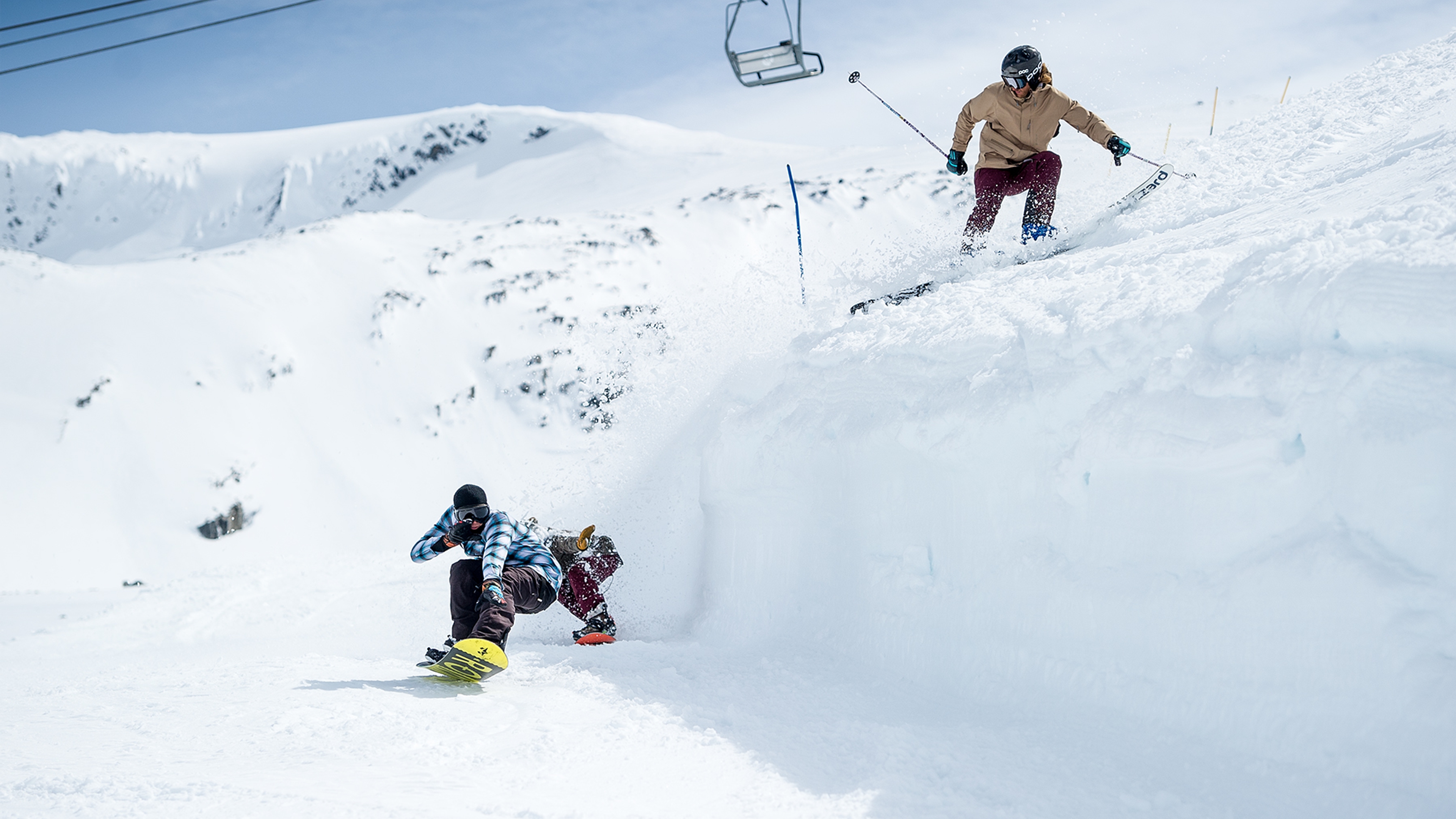 People snowboarding and skiing at Stryn summer ski resort in Fjord Norway